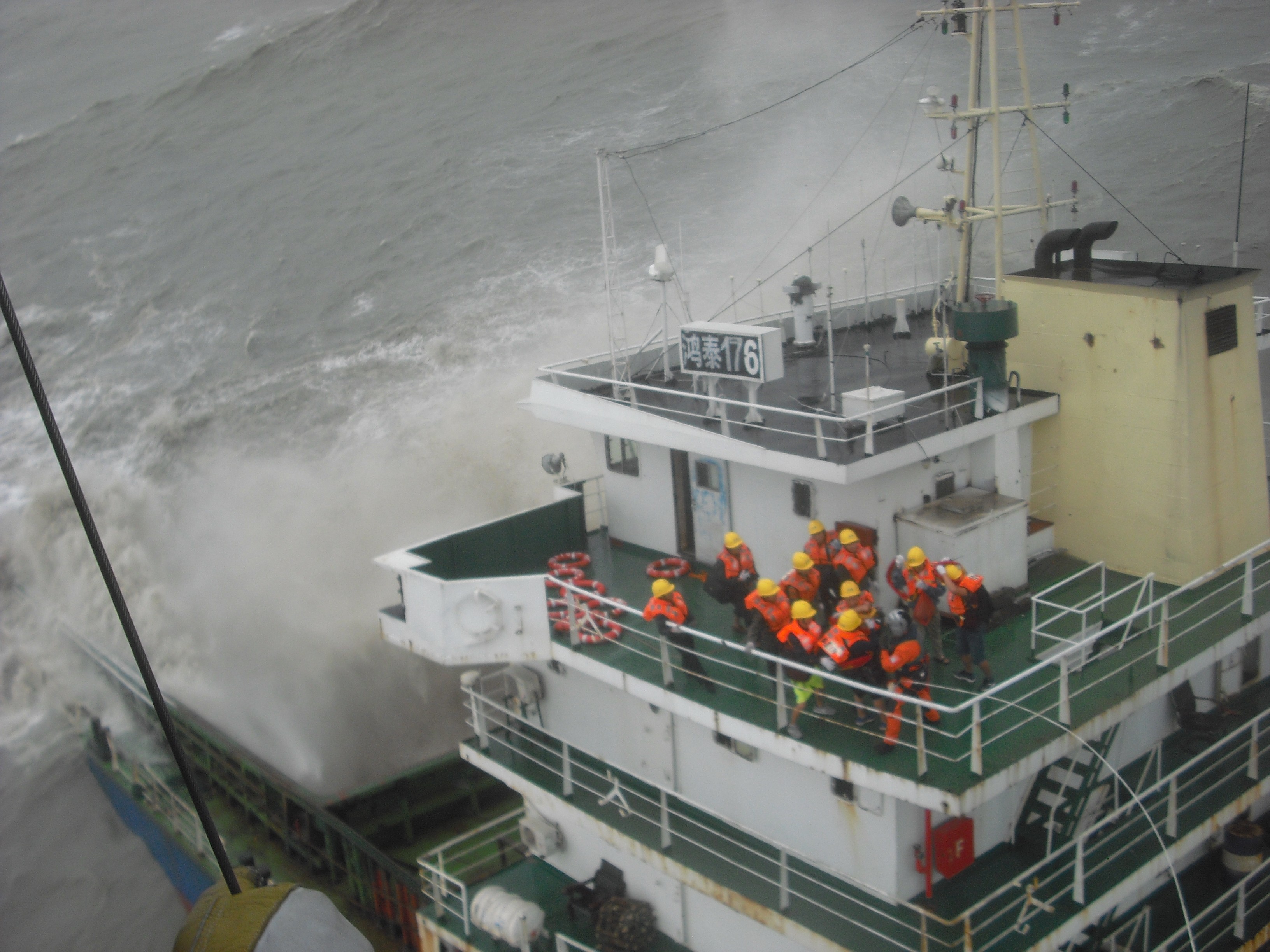 The Government Flying Service sent staff to rescue crew members aboard the Hong Tai 176 in waters east of Hong Kong on Sunday. Photo: Handout