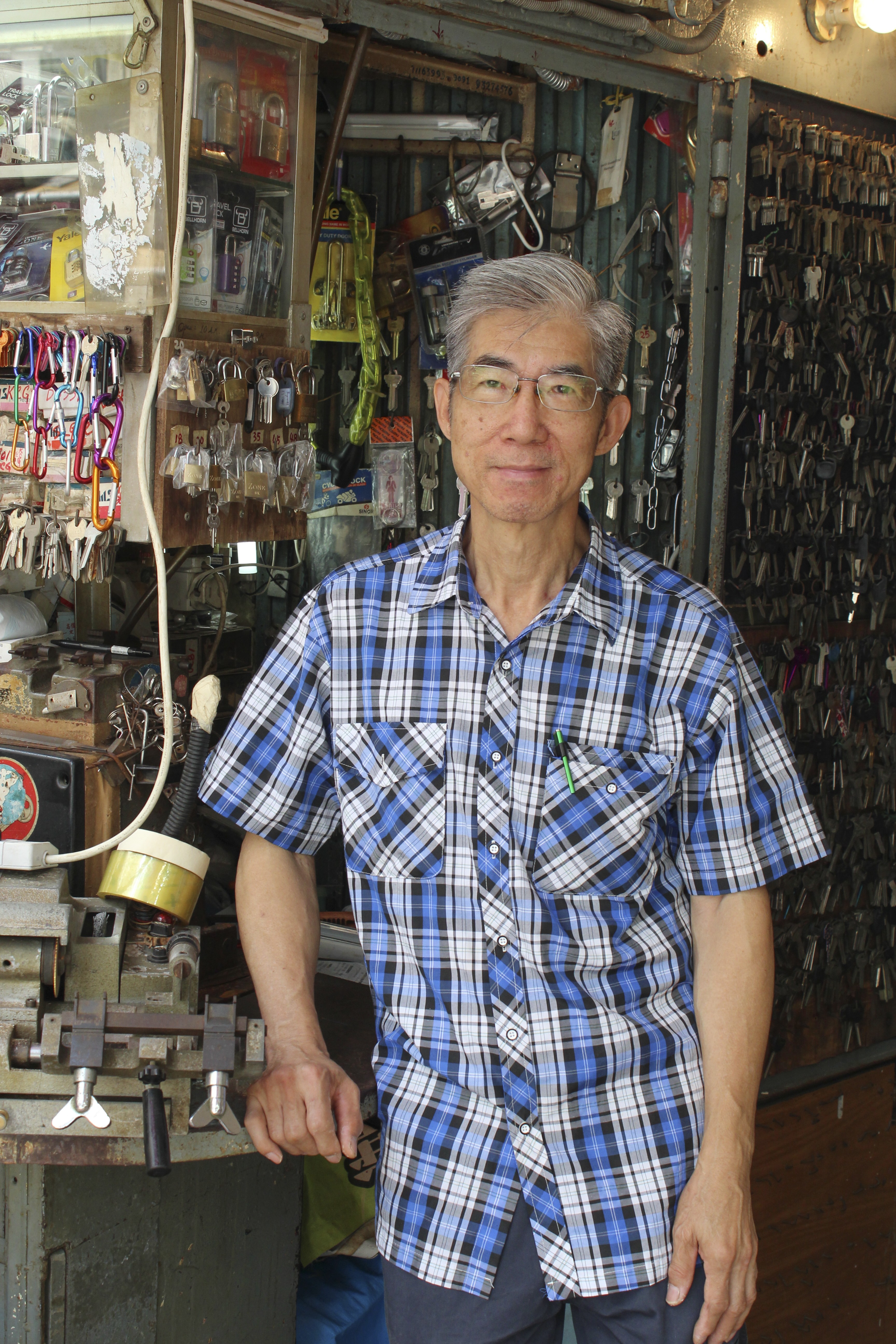 Chan Wai-tong has been a locksmith at his understairs store on Lockhart Road in Causeway Bay since 1985. Photo: Olivia Chan