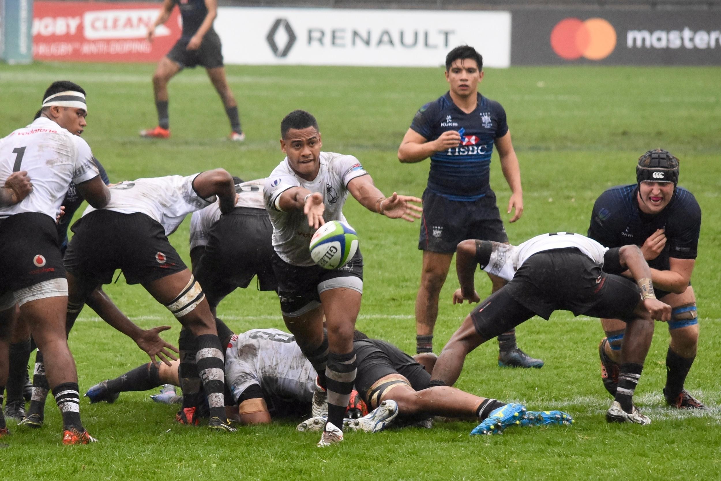 Hong Kong captain Mark Coebergh looks on as Fiji control the play. Photo: World Rugby