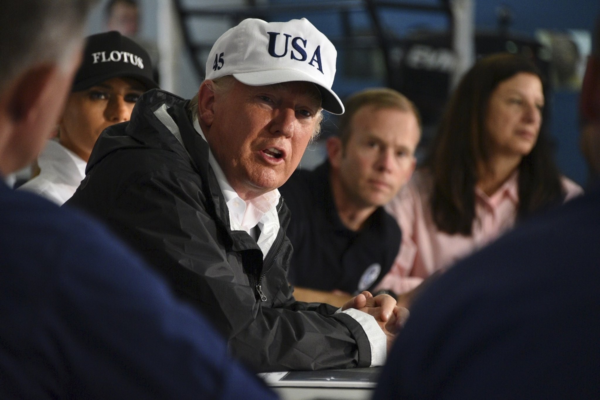 US President Donald Trump receives a briefing on Hurricane Harvey at a fire station in Corpus Christi, Texas, on Tuesday. Photo: EPA/Handout