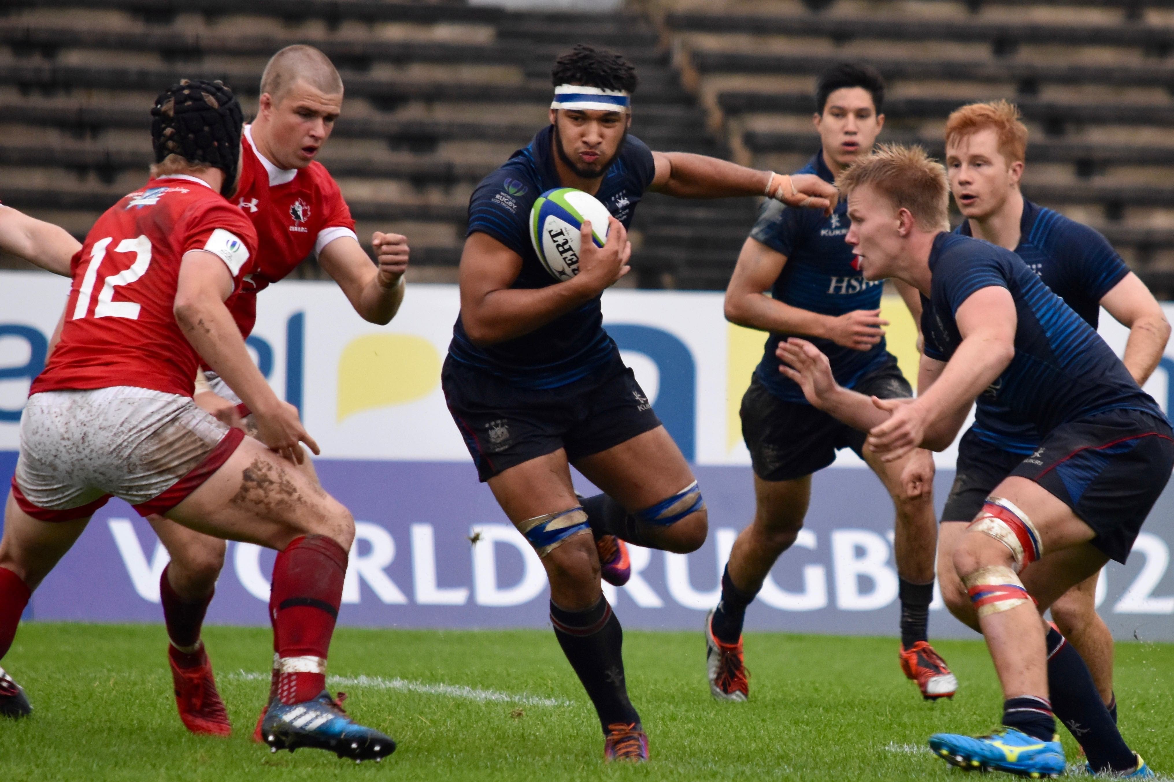 Max Denmark hunts for a gap in Hong Kong's loss to Canada at the World Rugby U20 Trophy. Photo: HKRU