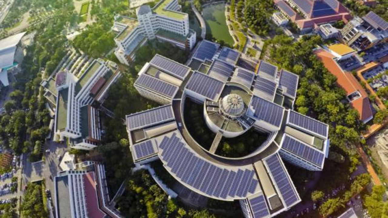 Solar panels are seen on the rooftops of Thammasat University, among the organisations that have installed the solar system to generate their own power. Photo: Bangkok Post