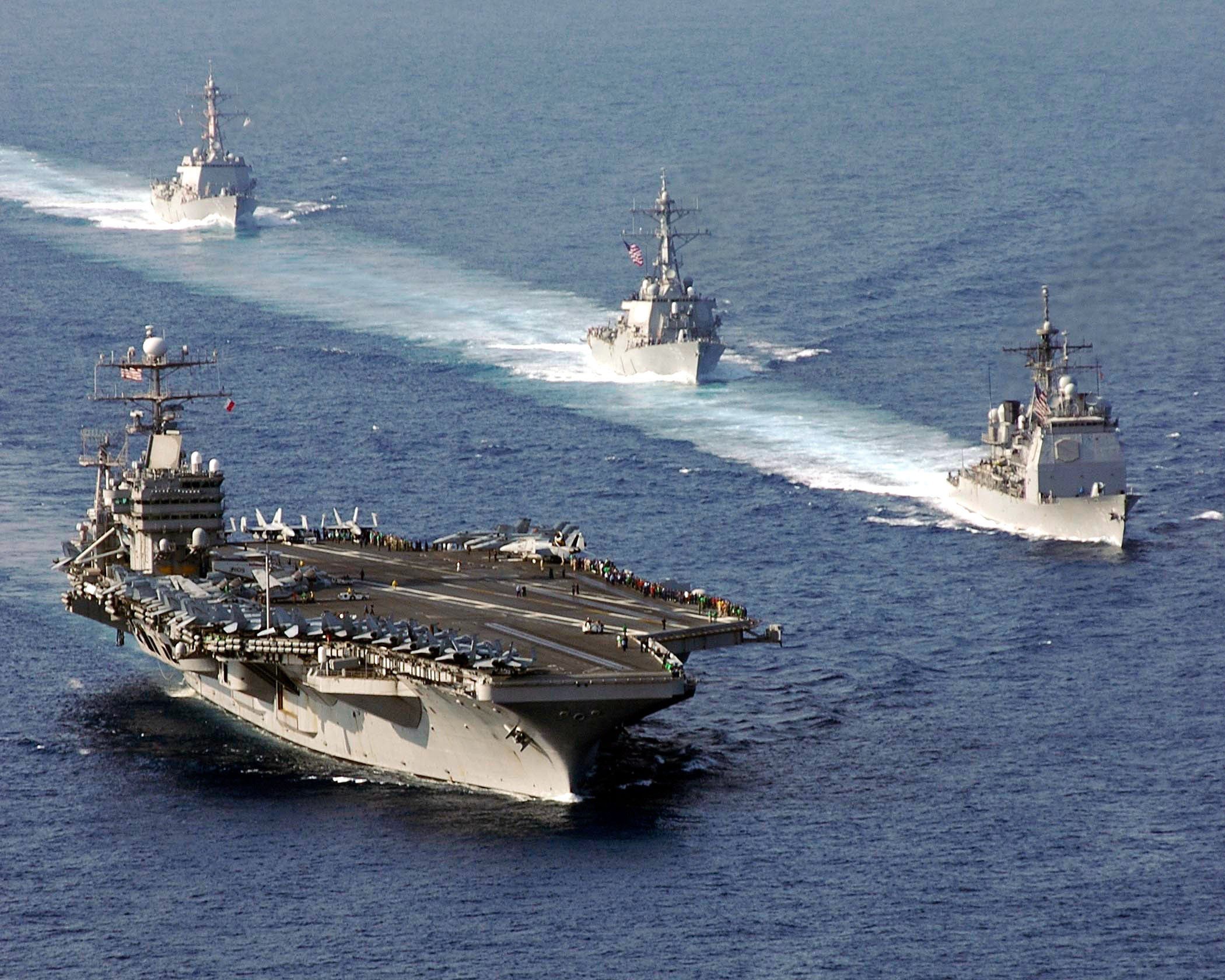 A file photo shows the aircraft carrier USS Abraham Lincoln and its support fleet. The carrier is headed to the Florida Keys as part of relief efforts. Photo: US Navy