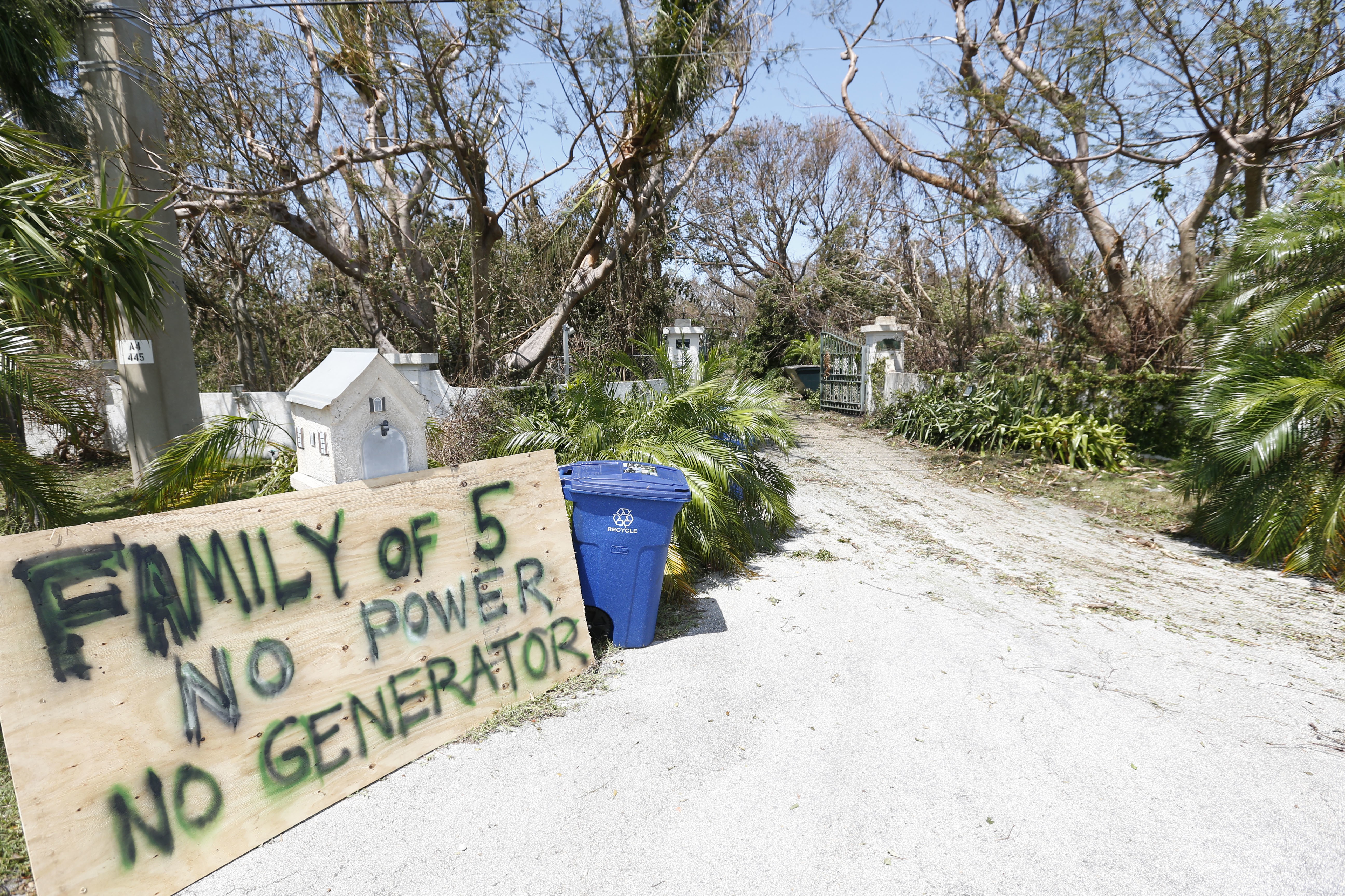 A sign outside a home where a family rode out Hurricane Irma is shown on Tuesday, September 12, 2017, in Key Largo, Florida, in the Florida Keys. Photo: AP