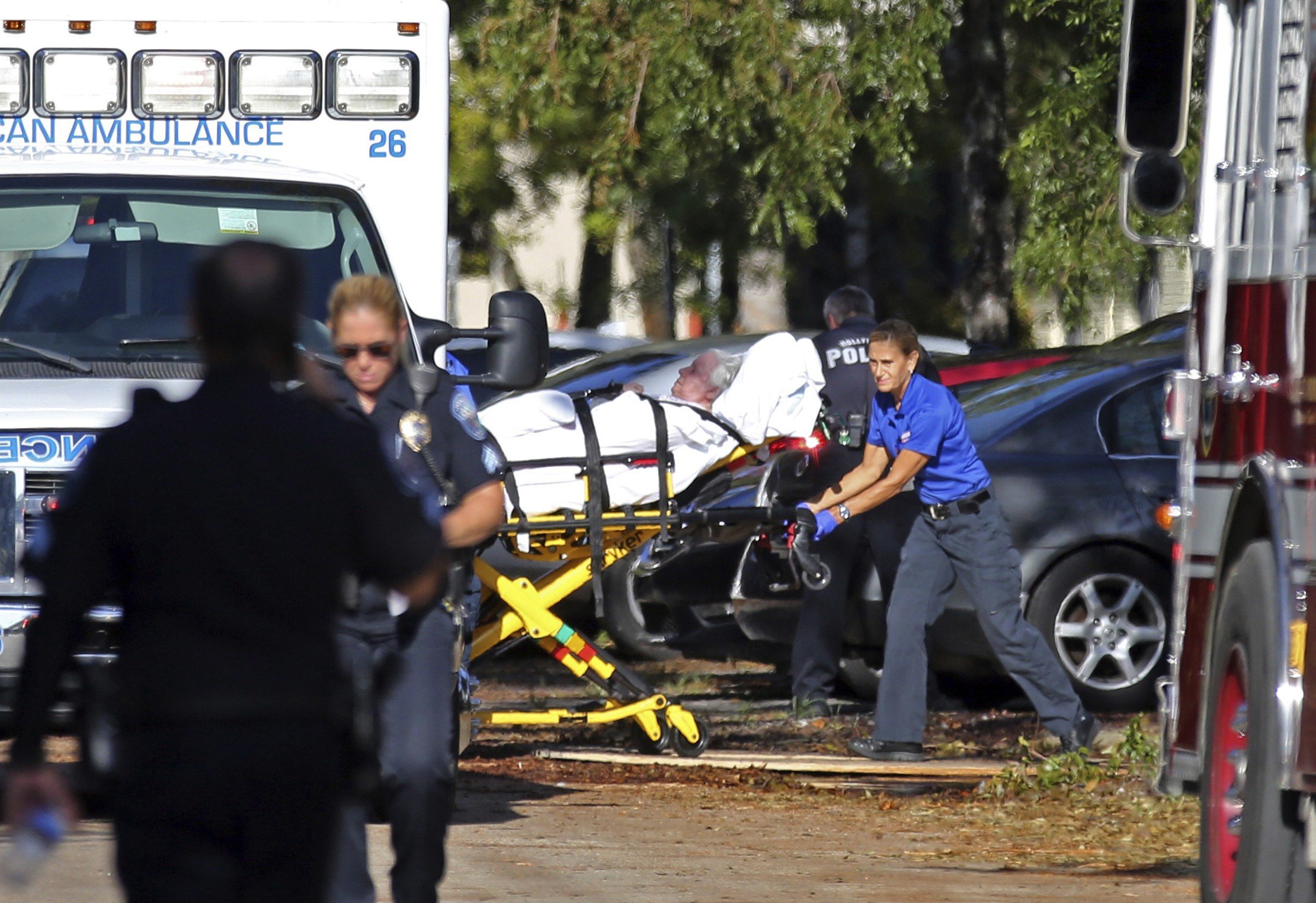 A woman is transported from The Rehabilitation Centre at Hollywood Hills in Florida, where eight patients died on Wednesday. Photo: AP