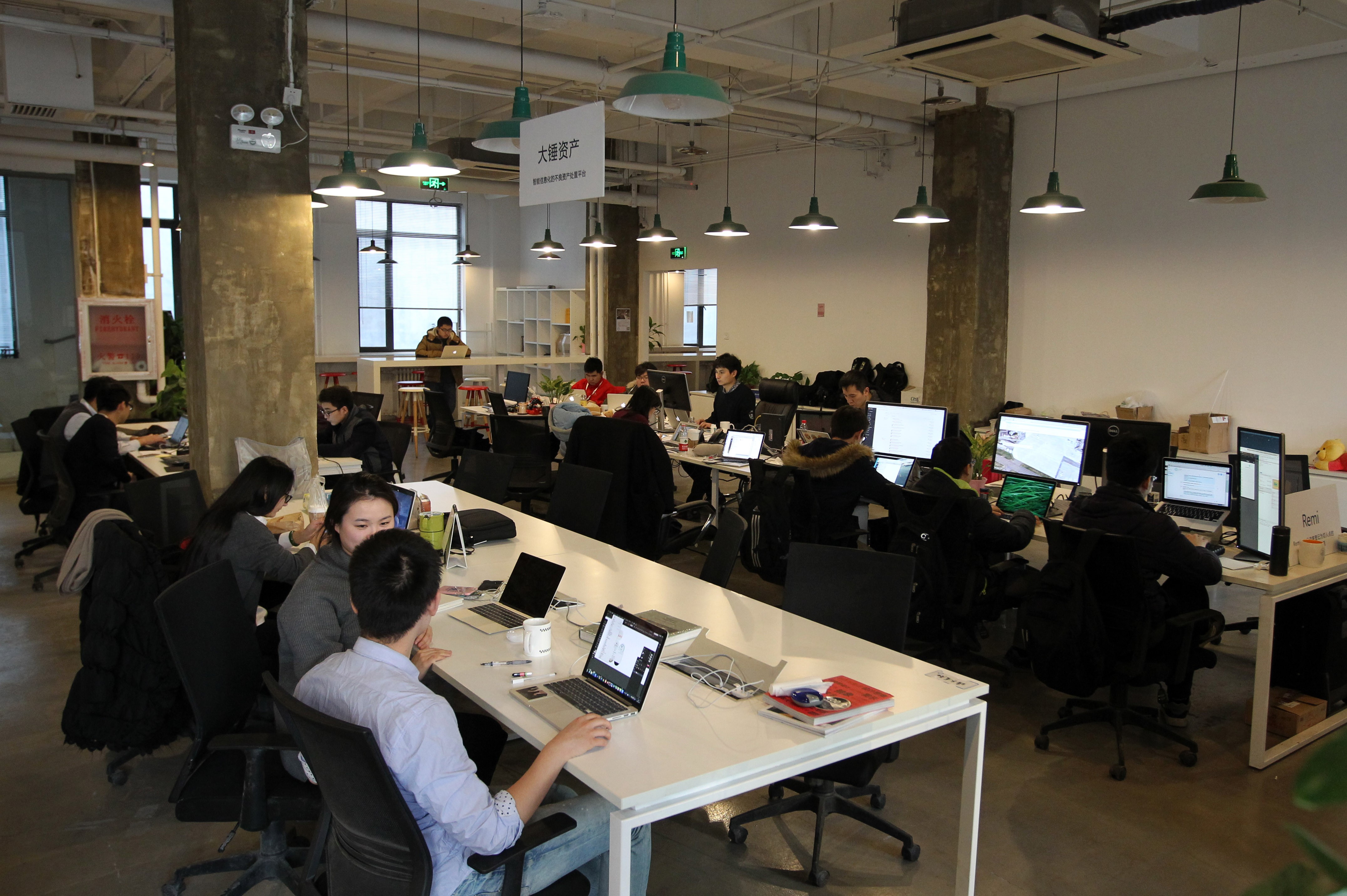 The co-working concept allows start-ups to save money on overheads by sharing a flexible, modern work environment with staff from other companies. Photo: Simon Song