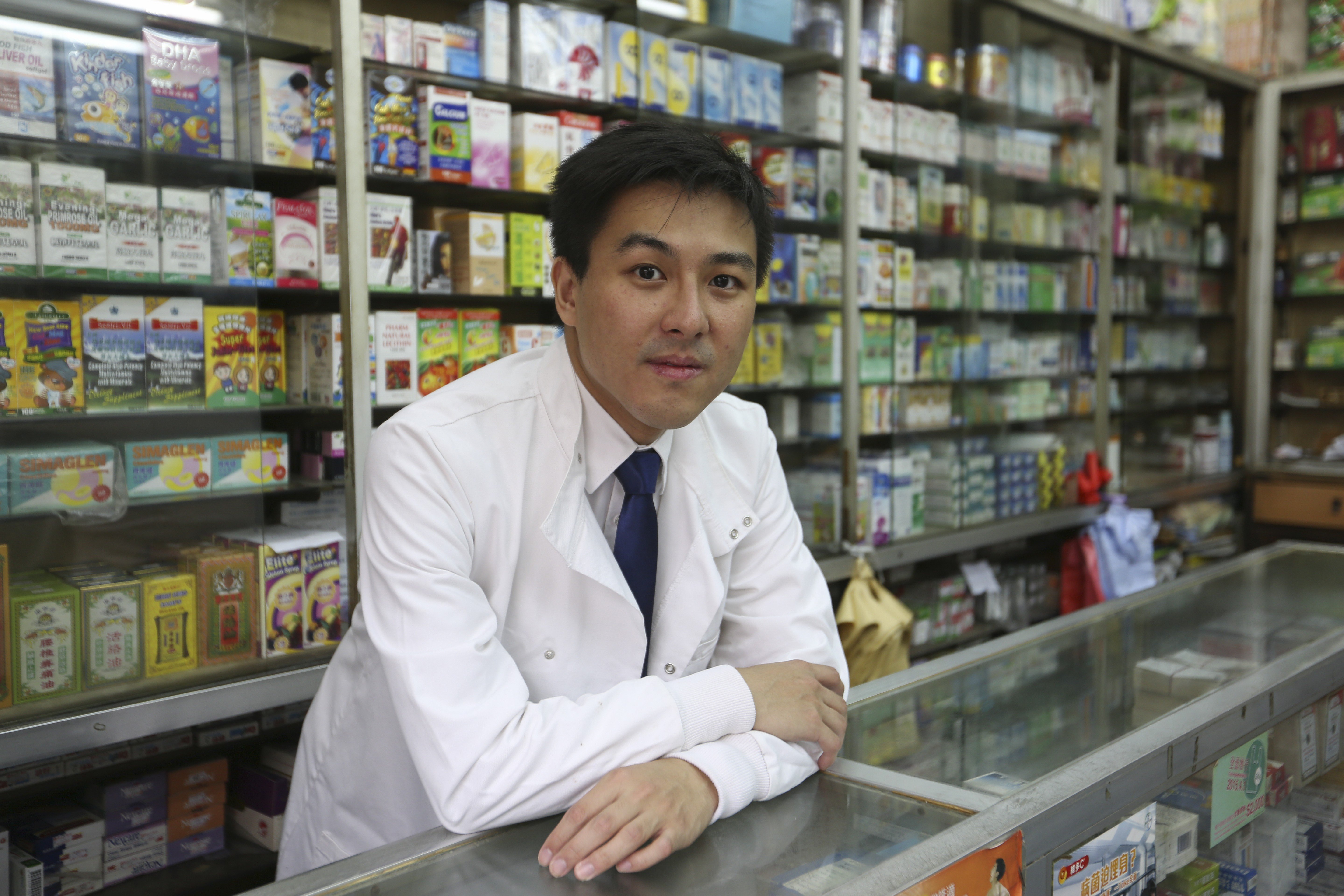 Matthew Wong, pharmacist and member of Pharmacists Connect, at Kam Seng Pharmacy on Lai Chi Kok Road in Sham Shui Po. Photo: Xiaomei Chen