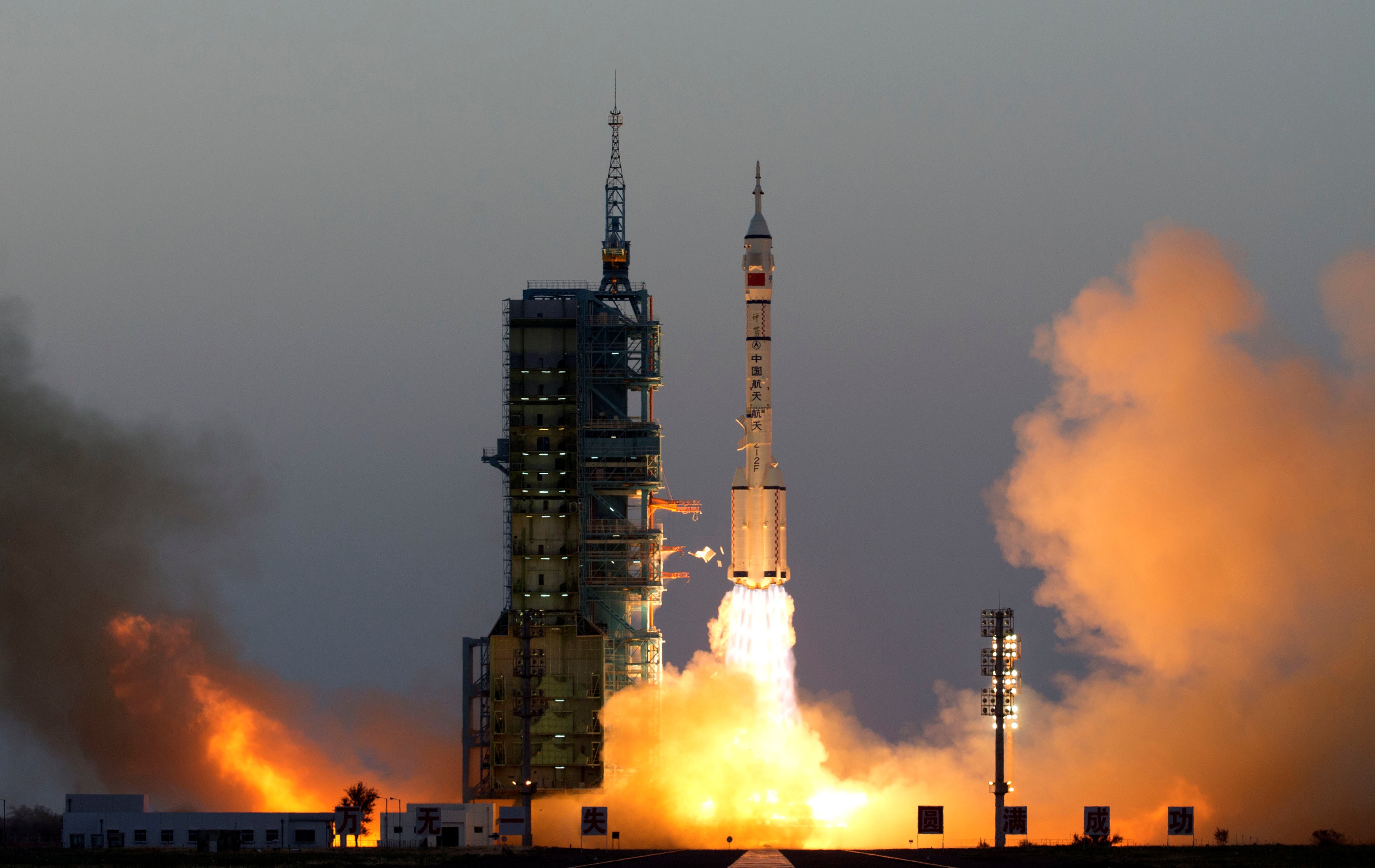 The Shenzhou-11 spacecraft carrying astronauts Jing Haipeng and Chen Dong and six silkworms blasts off from the launch pad in the Gobi Desert. Photo: Reuters