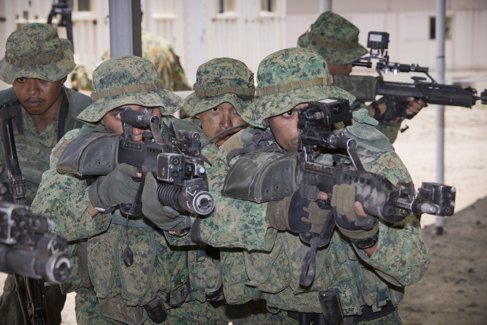 Singaporean soldiers take part in an overseas training exercise. Taiwan said on Monday it had been assured by Singapore that a long-standing military programme between the island and the city state would continue. Photo: Handout