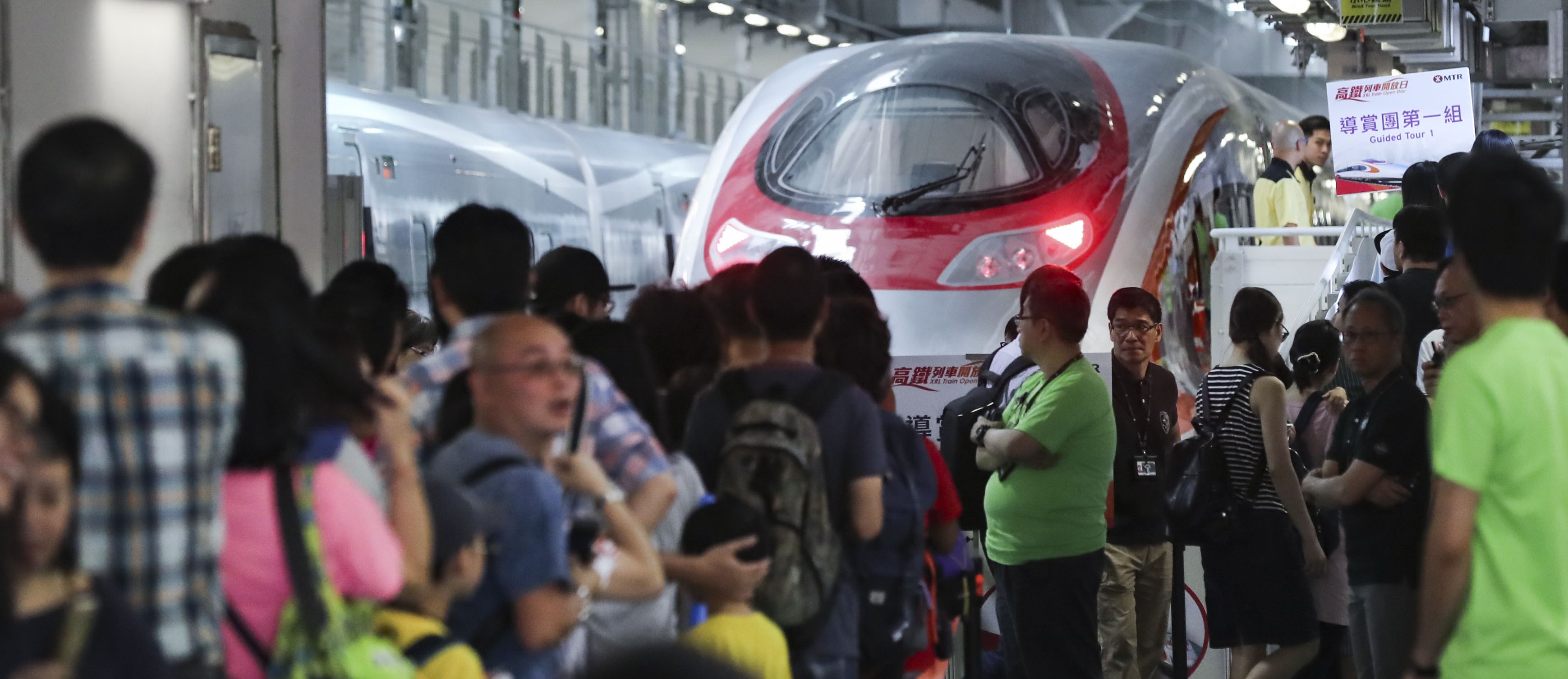 Members of the public get their first glimpse of the high-speed trains in Yuen Long. Photo: Edward Wong