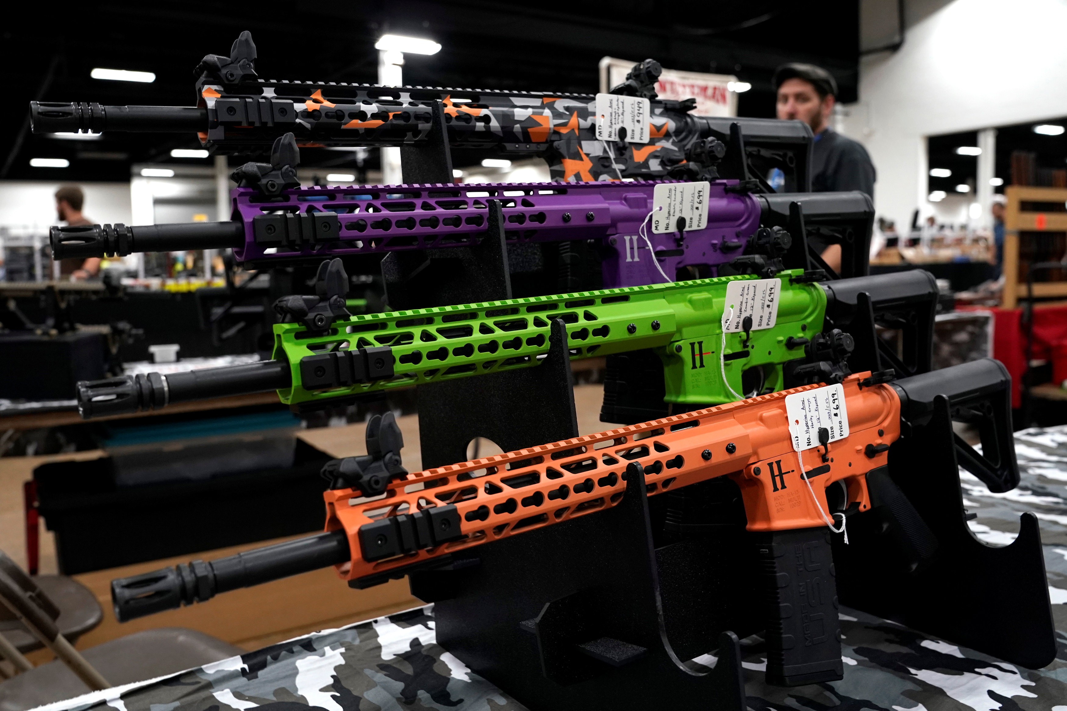 AR-15 rifles with colourful hand guards are displayed for sale at the Guntoberfest gun show in Oaks, Pennsylvania, on Friday. Photo: Reuters