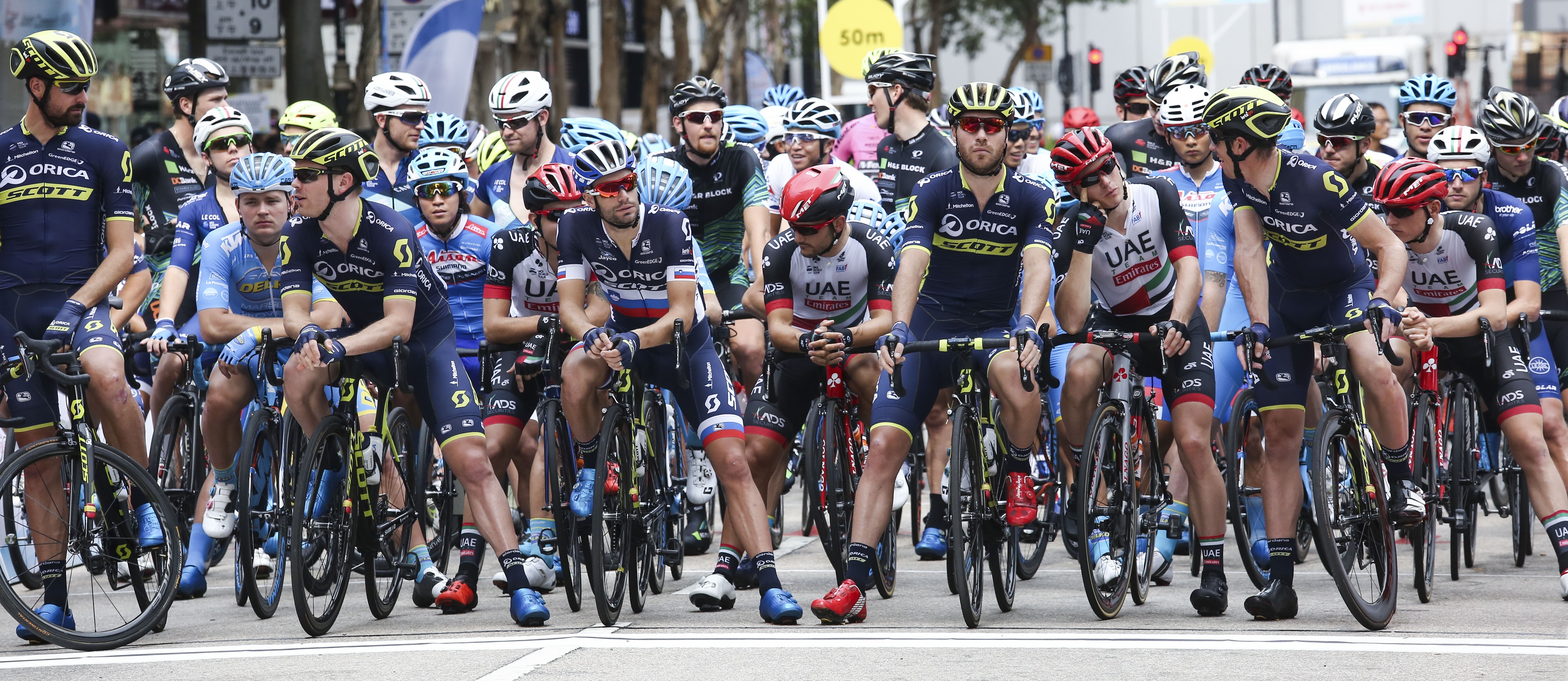 Riders gather for the start of Sunday’s Hong Kong Challenge criterium race. Photo: Jonathan Wong