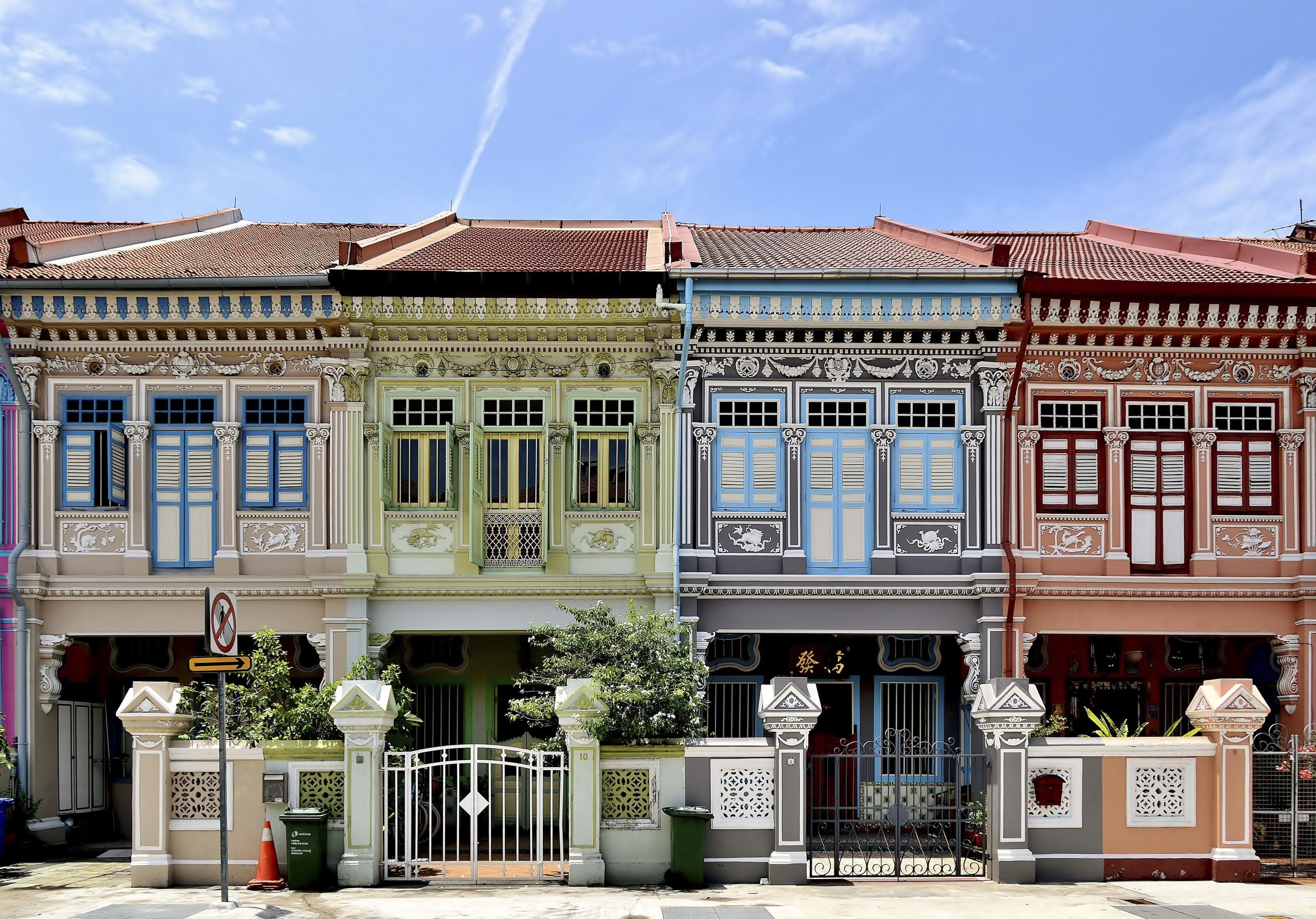 A row of four traditional Singapore Peranakan shop houses in the historic Joo Chiat area. Photo: Alamy