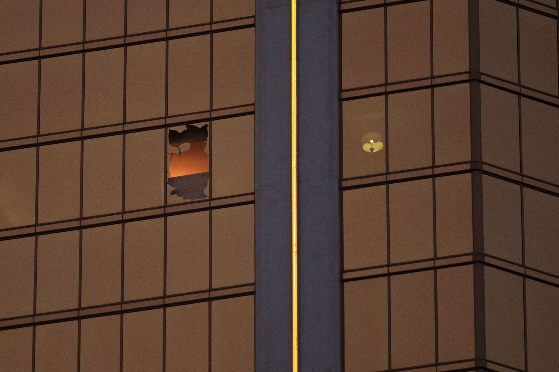 A smashed window in Room 32-135 of the Mandalay Bay Resort and Casino bears testimony to the mass slaughter conducted by Stephen Paddock, as he fired from the room into a crowd below on October 1. Photo: AFP