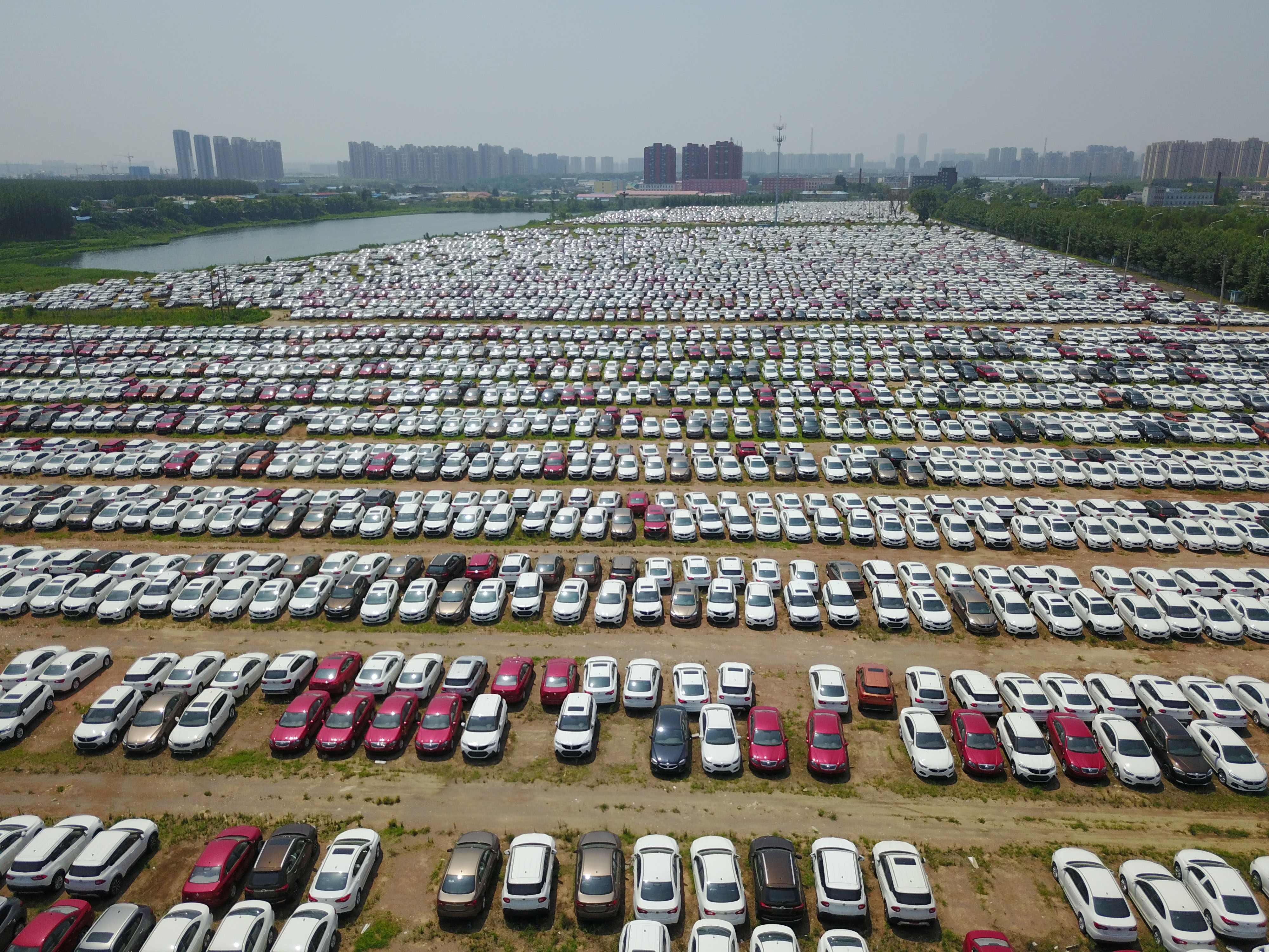 New cars outside the Brilliance Auto factory in Shenyang, in China's northeast Liaoning province. Photo: AFP
