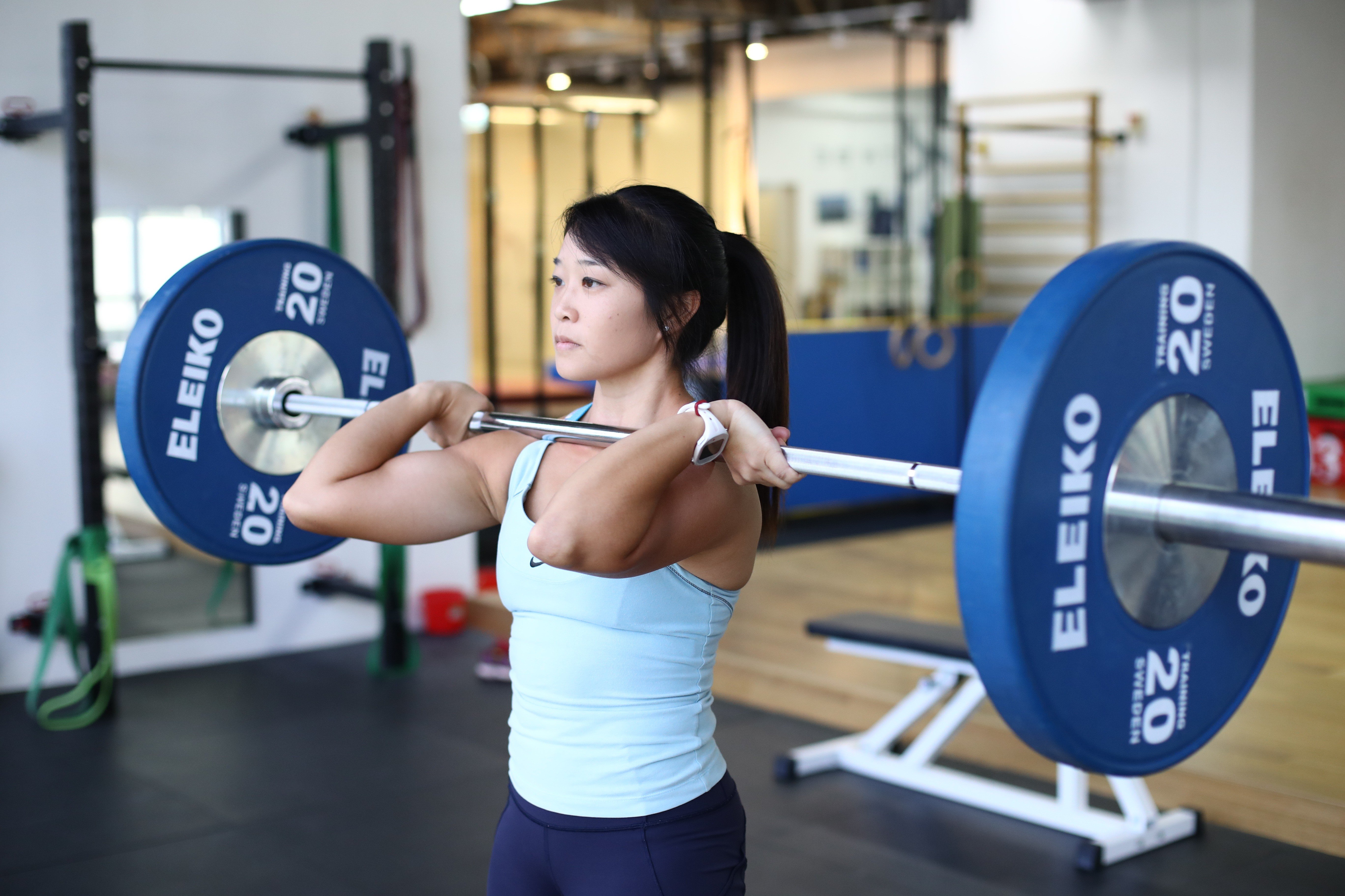 Weightlifter and founder of Trybe Studio, Kay Kay Keung, works out at Trybe Studio in Wong Chuk Hang. Photo: Nora Tam