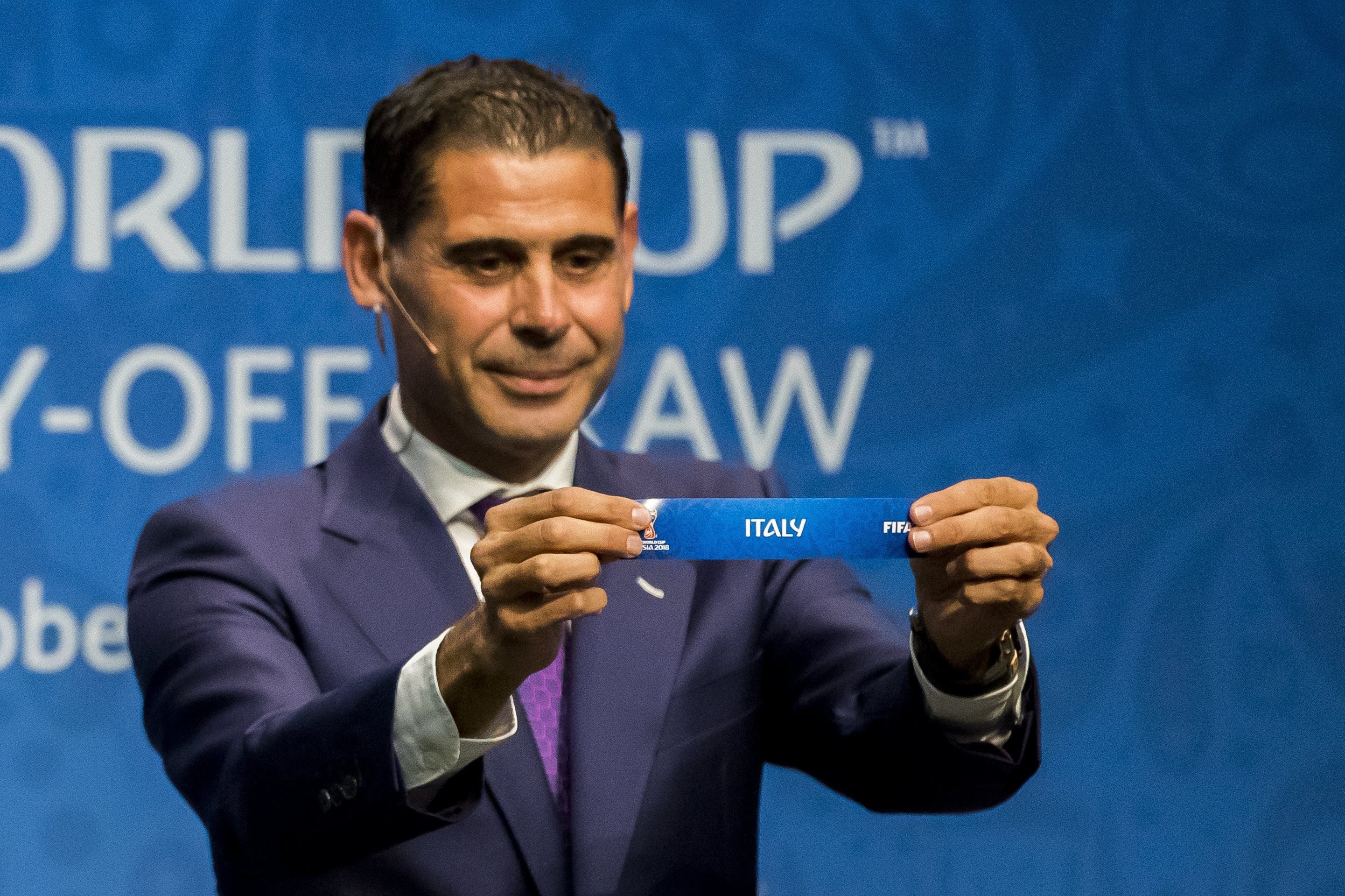 Former Spain player Fernando Hierro shows the lot of Italy during the 2018 World Cup European play-off draw in Switzerland. Photo: EPA