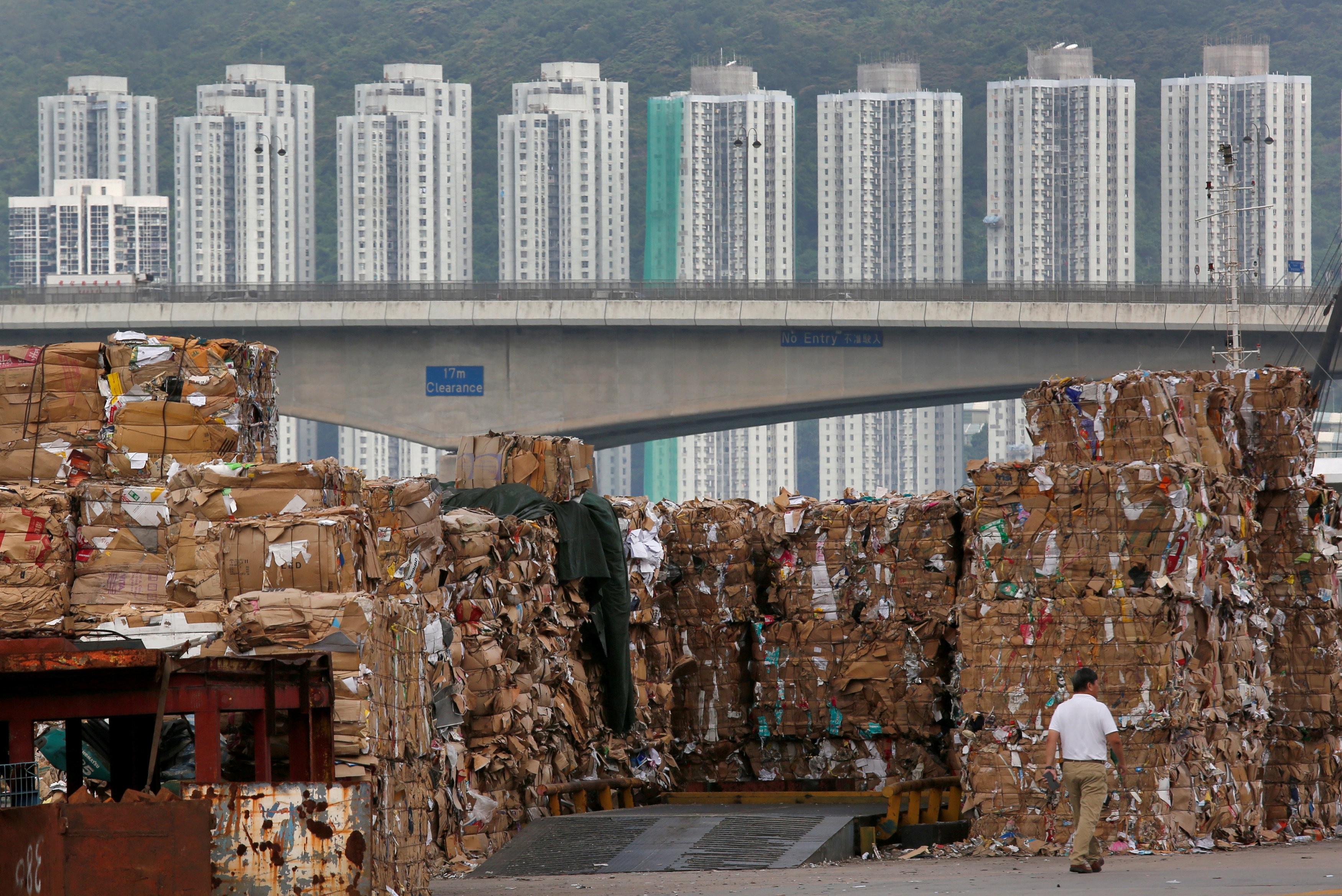 Tonnes of waste paper to be shipped to mainland China is piled up at a dock in Hong Kong, on September 15, after stricter requirements for waste imports into the mainland were announced. Photo: Reuters