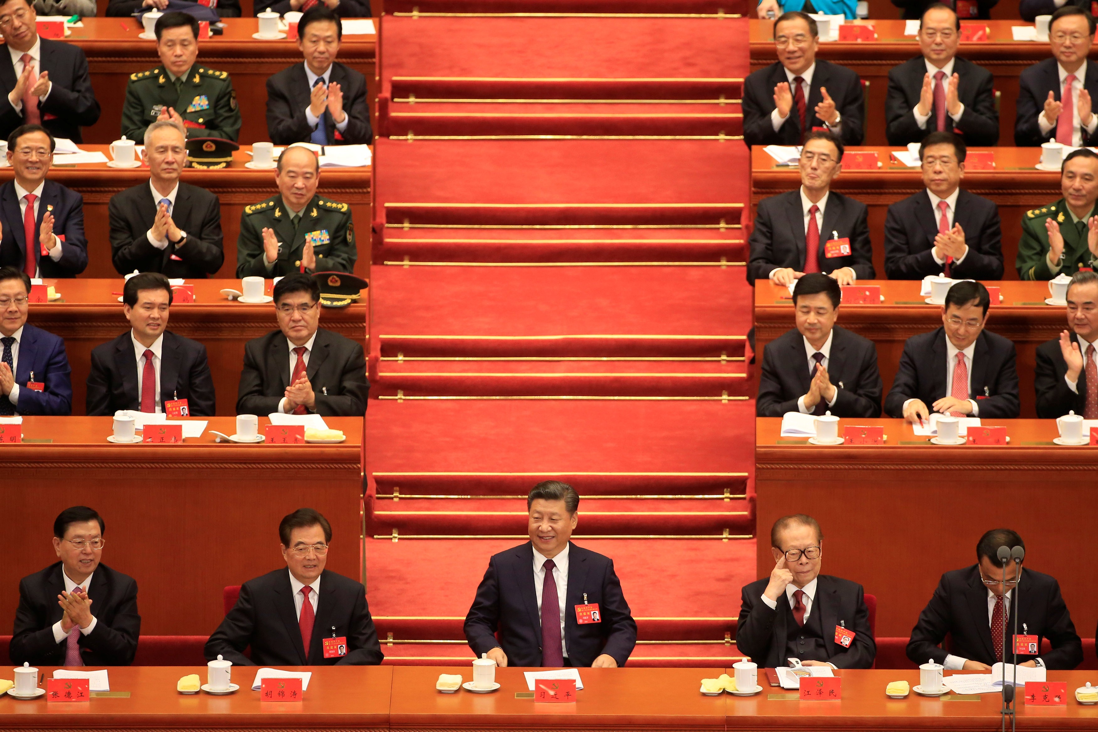 Chinese President Xi Jinping beside Chairman of the Standing Committee of the National People's Congress Zhang Dejiang, former Chinese President Hu Jintao, former President Jiang Zemin and Chinese Premier Li Keqiang during the opening of the 19th National Congress of the Communist Party of China at the Great Hall of the People in Beijing, China on October 18, 2017. Photo: Reuters
