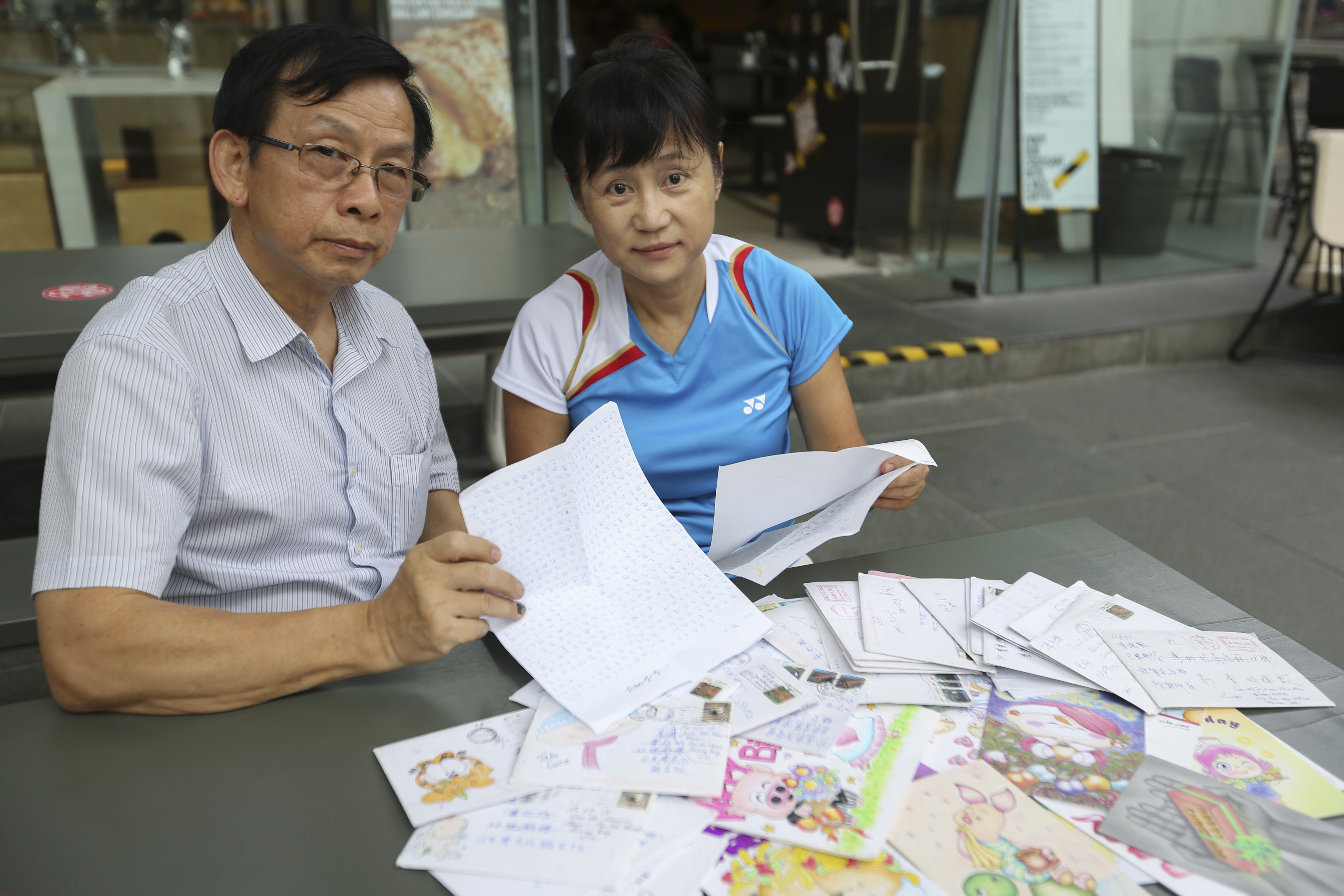 Prisoners’ Friends’ Association president Jack Fung Sun-wah and member of the association Michelle Lui Kit-hing. Lui has been writing to inmates since 2010 and has received about 1,500 letters from prisoners. She currently writes to 15 inmates. Photo: Xiaomei Chen