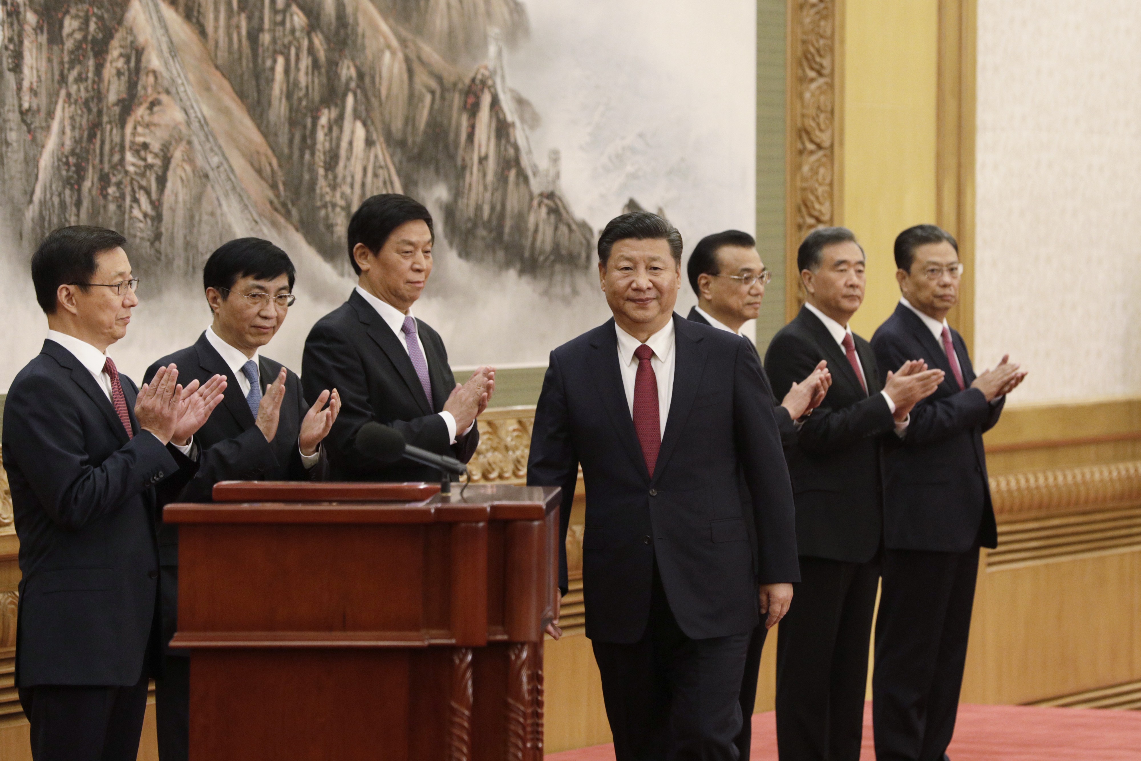 China’s President Xi Jinping (centre) is flanked by his fellow members of the elite Politburo Standing Committee. They are:(from left) Han Zheng, Wang Huning, Li Zhanshu, Li Keqiang, Wang Yang and Zhao Leji. Photo: Bloomberg.