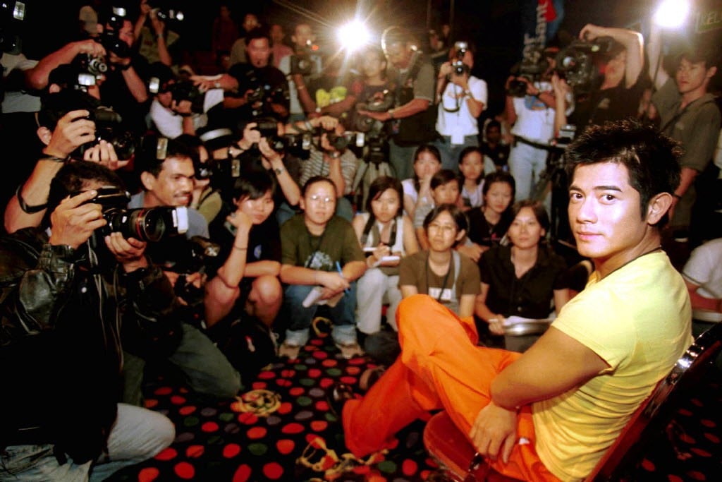 Hong Kong singer, dancer and actor Aaron Kwok, here at the launch of his 2000 film, ‘Legend of the East’, in Malaysia, has spent 27 years in the spotlight. Photo: AP
