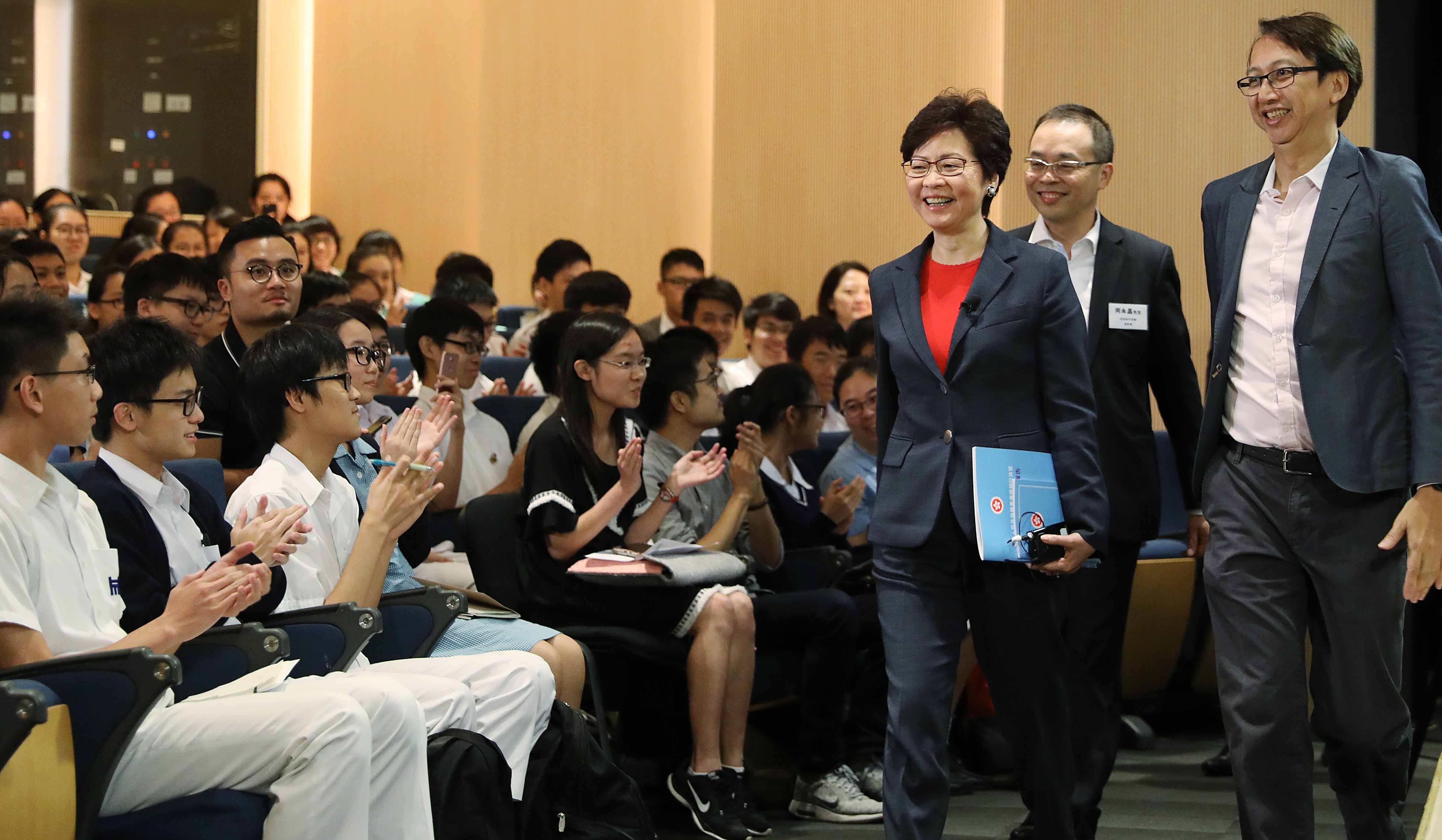 Chief Executive Carrie Lam arrives for a discussion with students about policy address initiatives, at the Federation of Youth Groups Jockey Club Media 21 venue in Aberdeen, on October 16. Photo: Sam Tsang