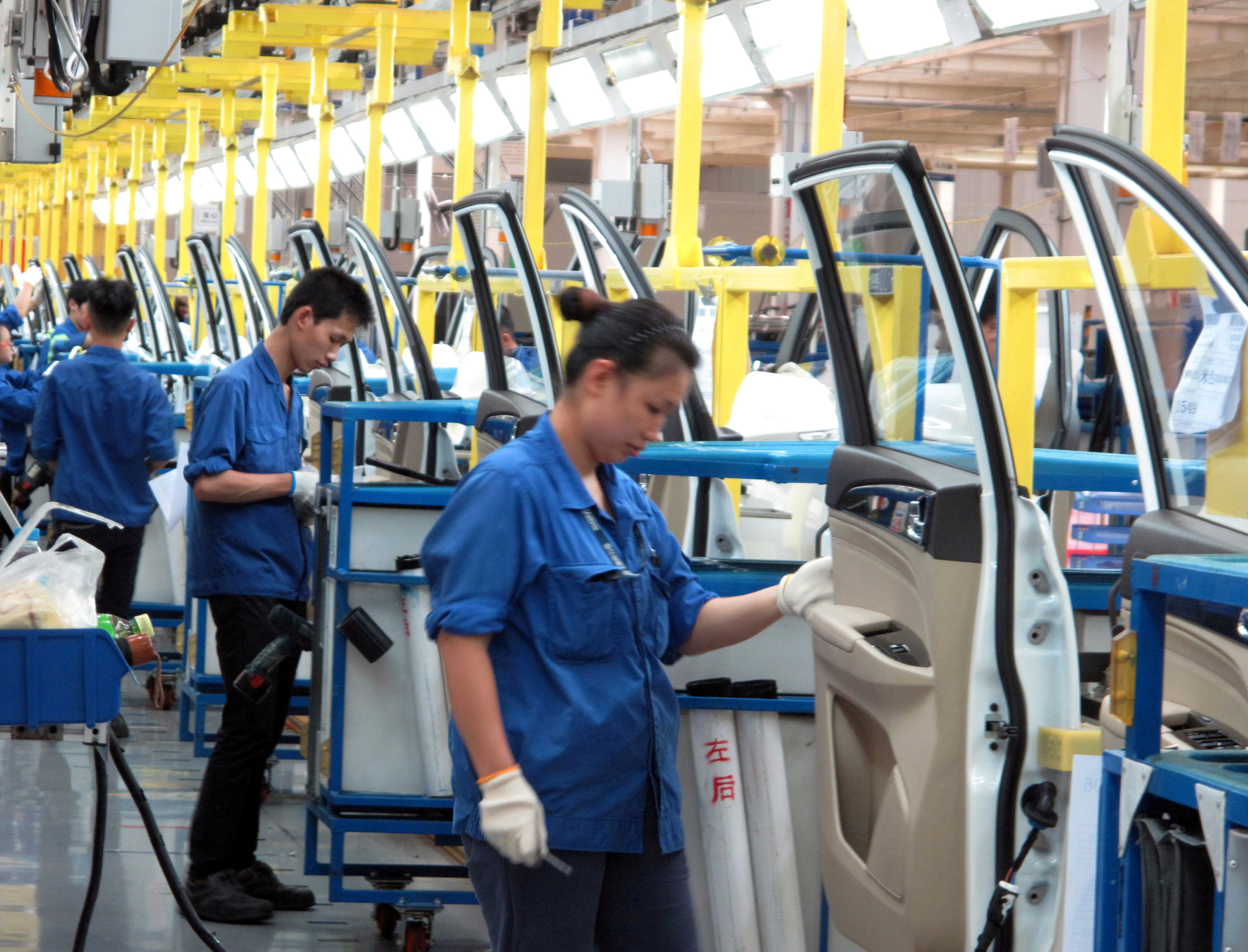 A production line inside a factory of SAIC-GM-Wuling, in Liuzhou, China. Photo: Reuters
