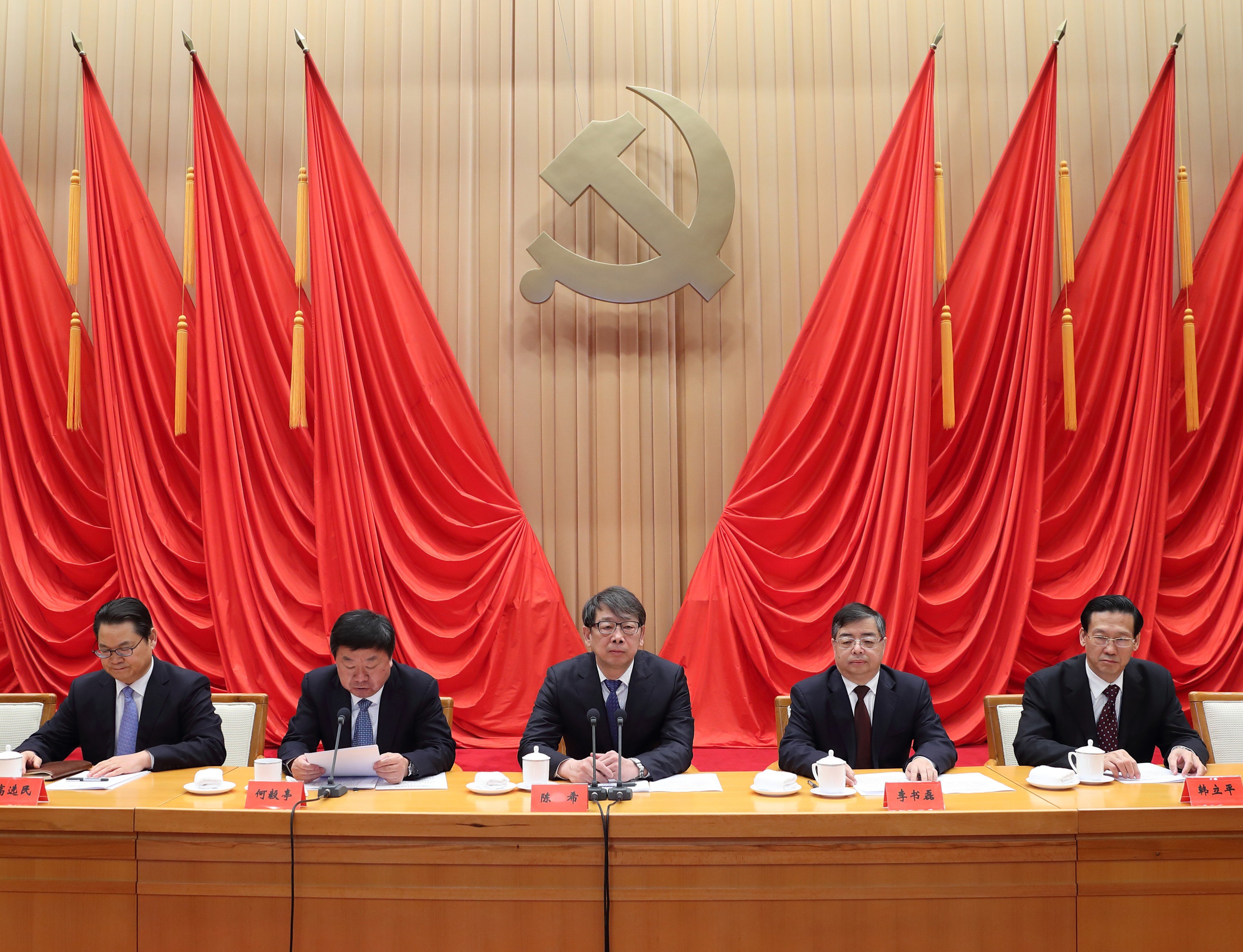 Chen Xi (centre), the recently appointed personnel chief, said the violation of political principles was no less damaging to China’s Communist Party than corruption. Photo: Xinhua