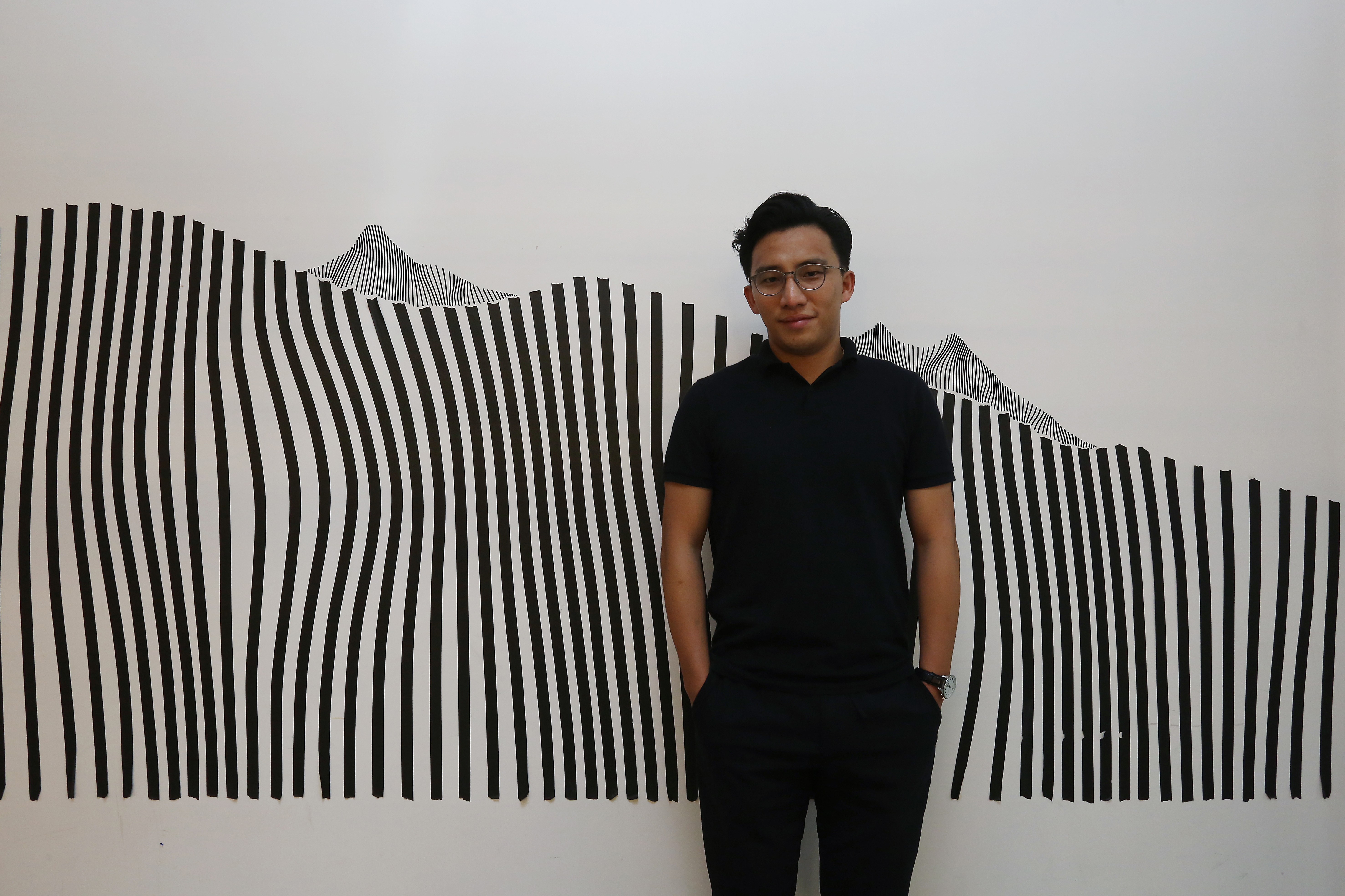 Wesley Ng relies on the vision and enthusiasm of his young staff. Photo: Jonathan Wong