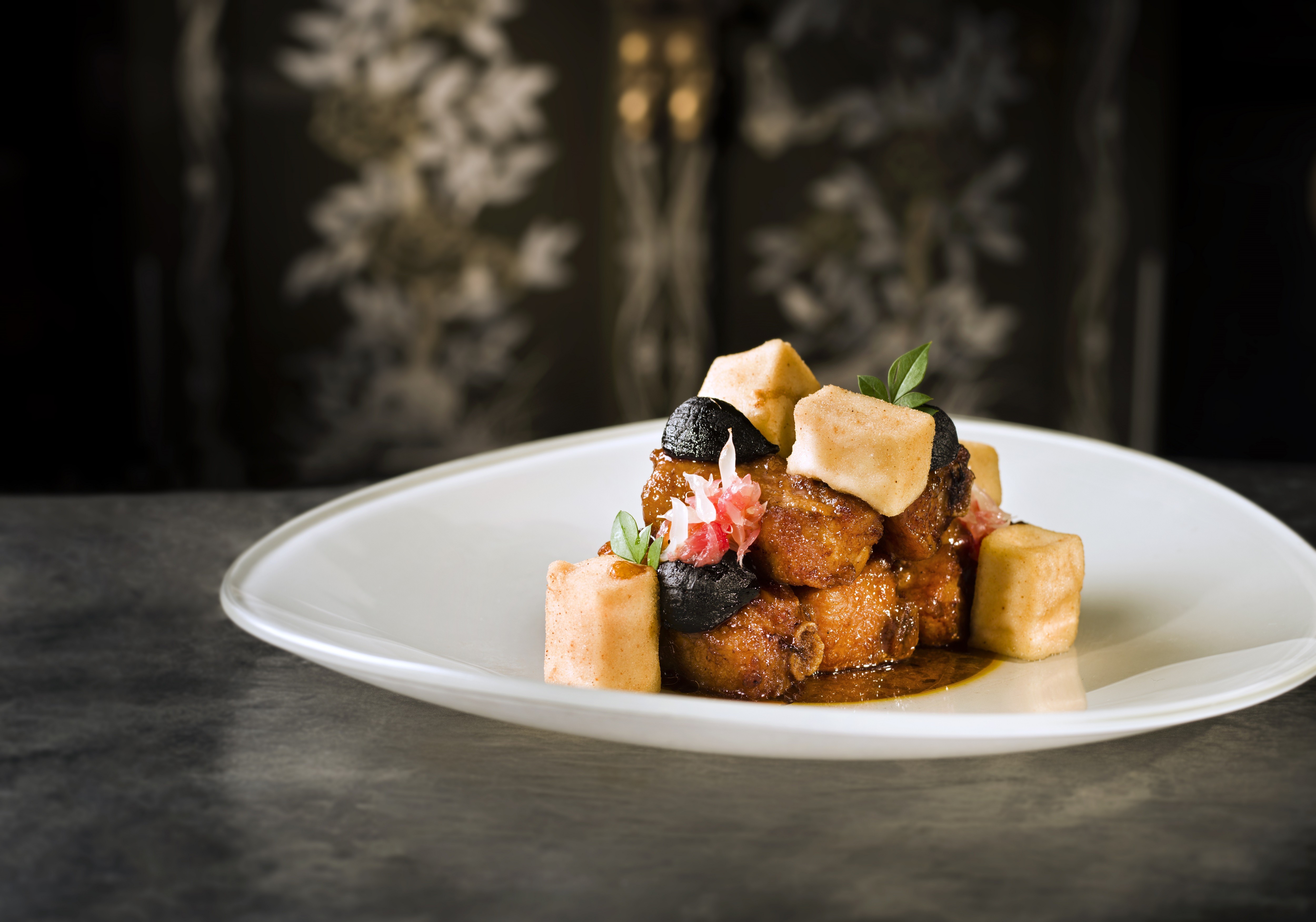 Braised pork ribs with preserved garlic in vintage vinegar and pomelo Sauce at Lai Heen, in the Ritz-Carlton, Macau.