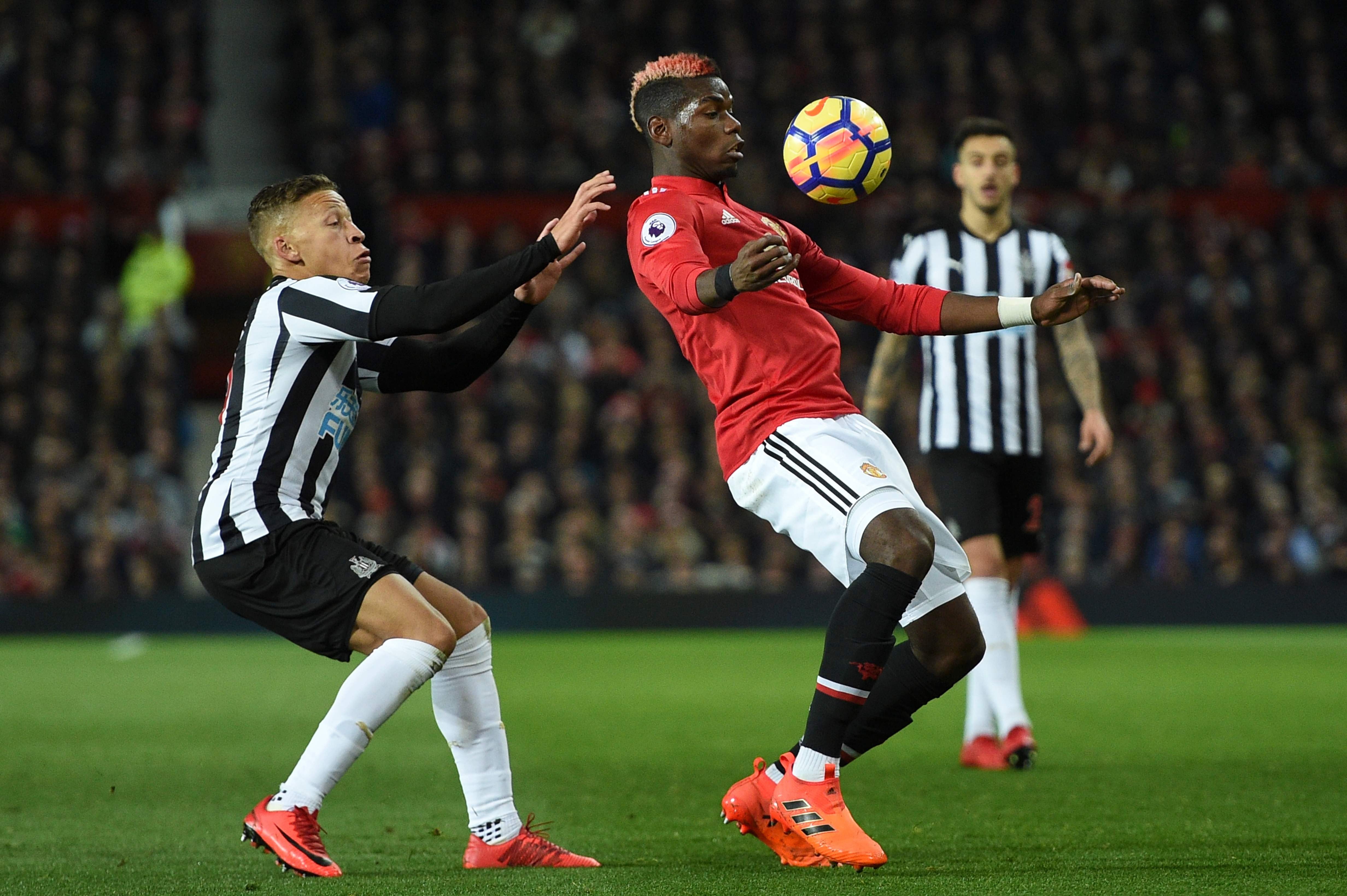 Paul Pogba (right) is back from injury and made an immediate impact against Newcastle. Photo: AFP