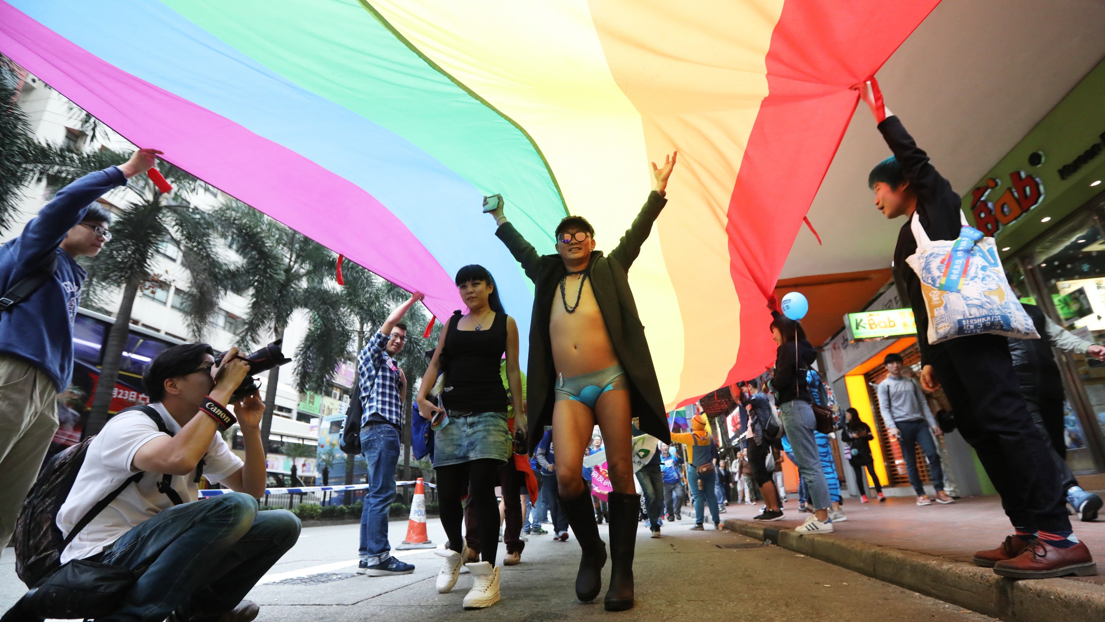 Participants march from Causeway Bay to Central in the ninth annual Pride Parade in Hong Kong. Photo: Edward Wong