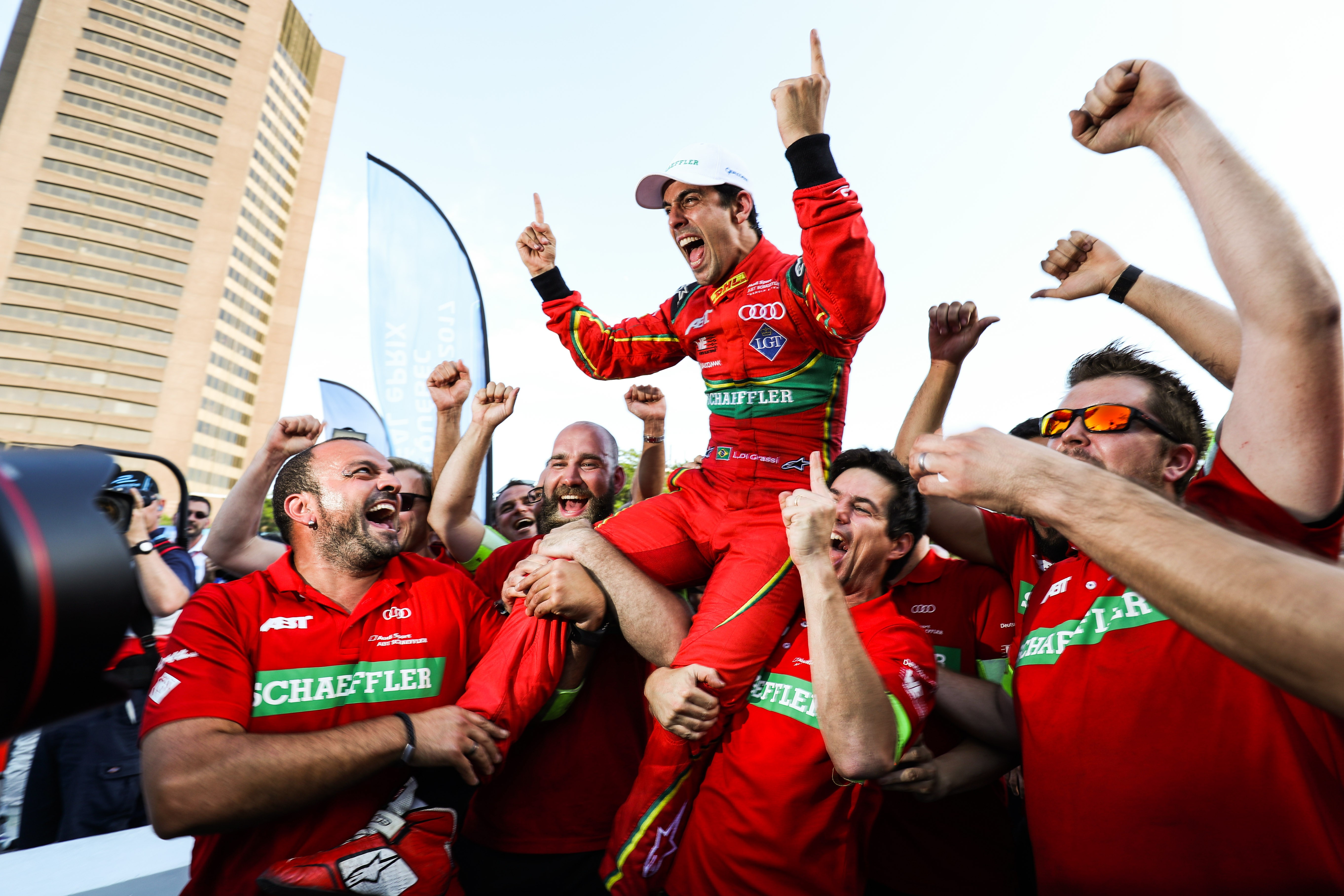 Lucas di Grassi celebrates winning his first Formula E title with his team. Photo: Formula E