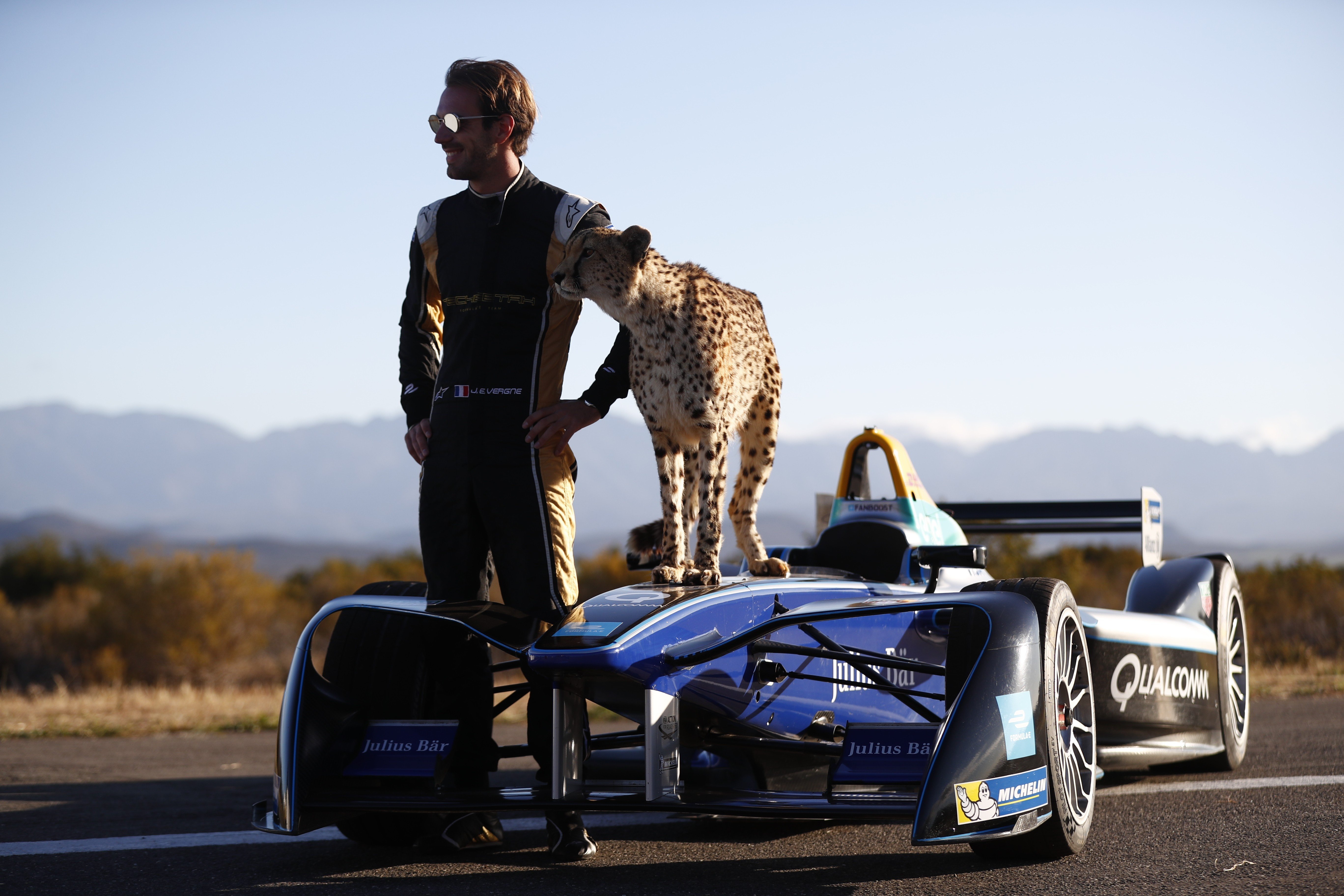 Jean-Eric Vergne prepares for the new Formula E season by racing a cheetah in Western Cape, South Africa. Photo Handout