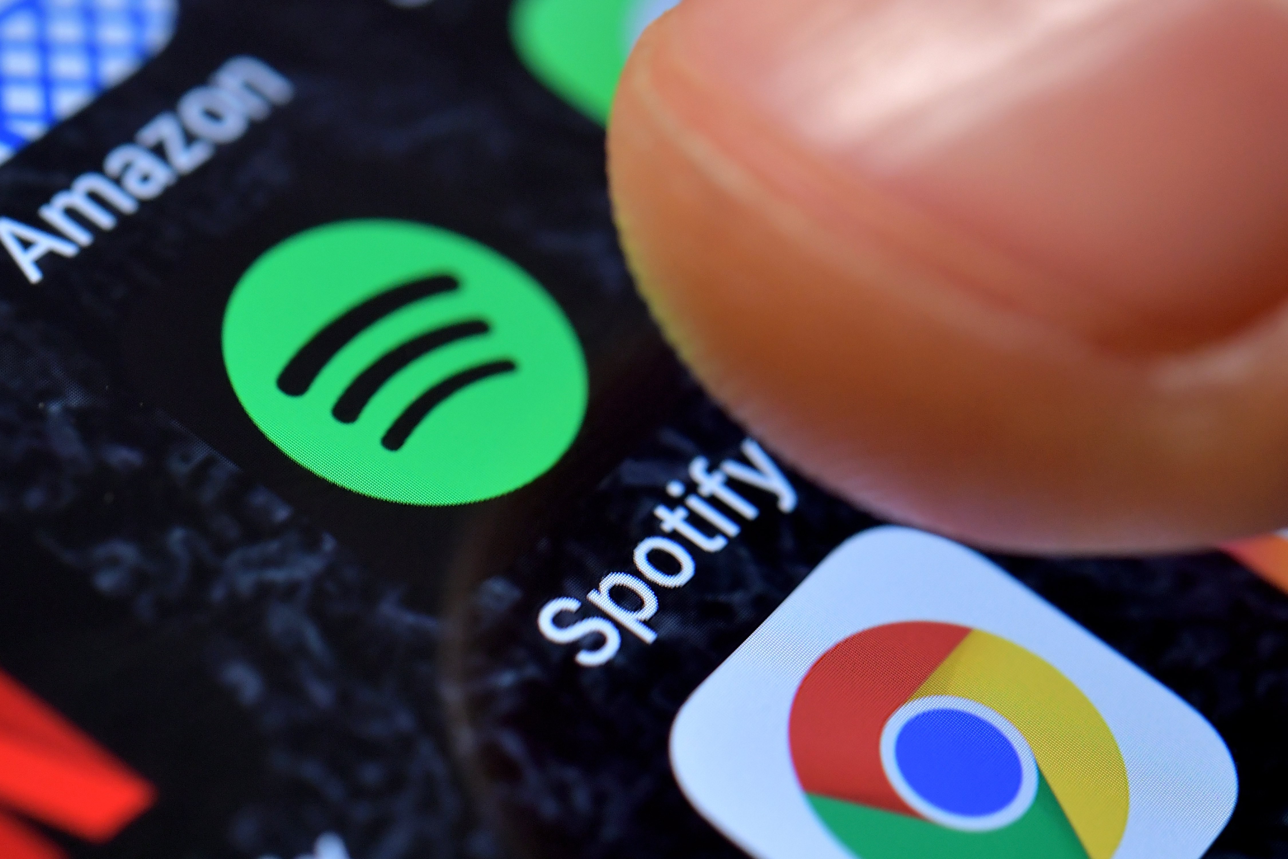 Tencent Music and Spotify are considering a share swap. Photo: EPA