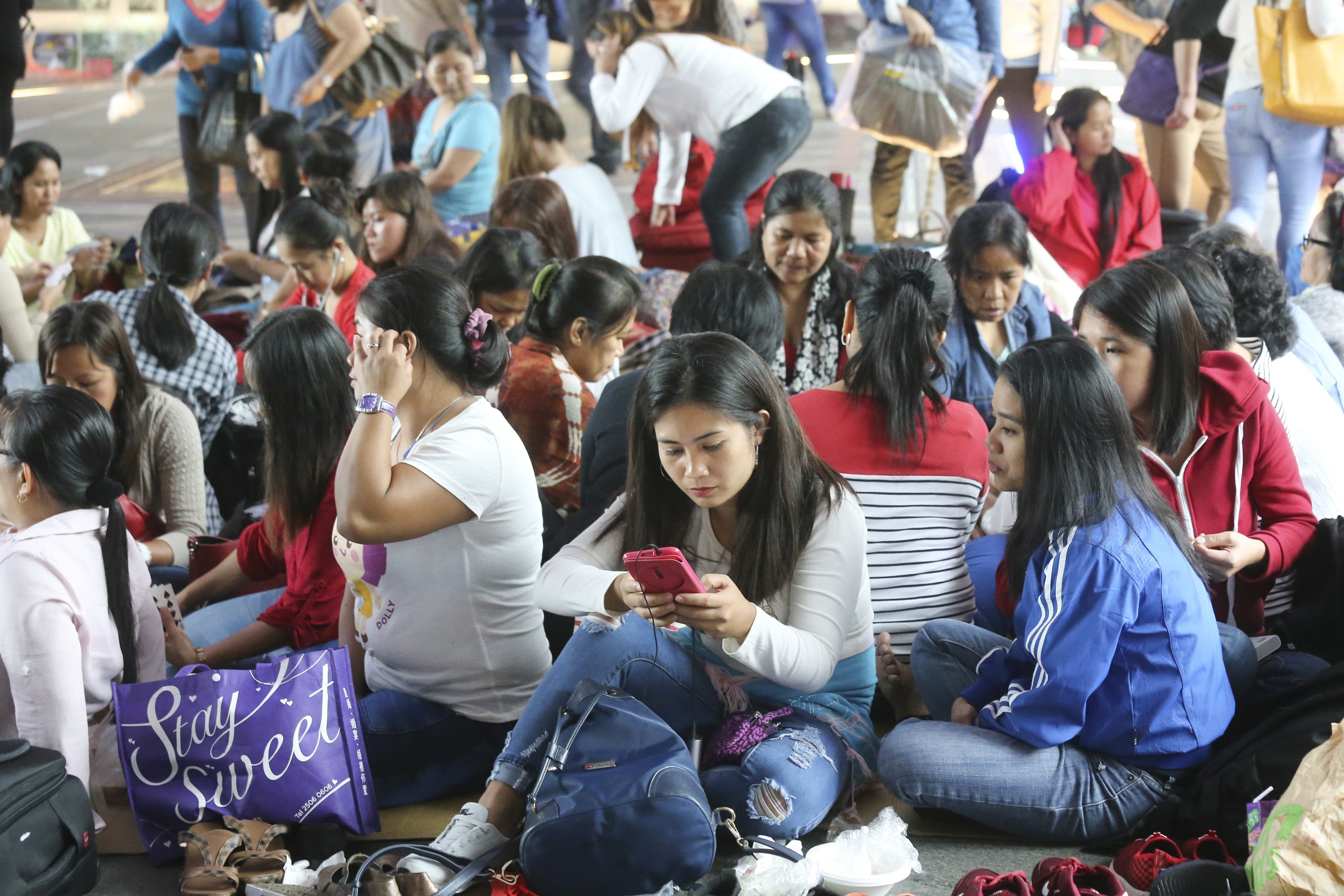 Filipino domestic helpers during a weekend gathering in Central. Photo: Dickson Lee