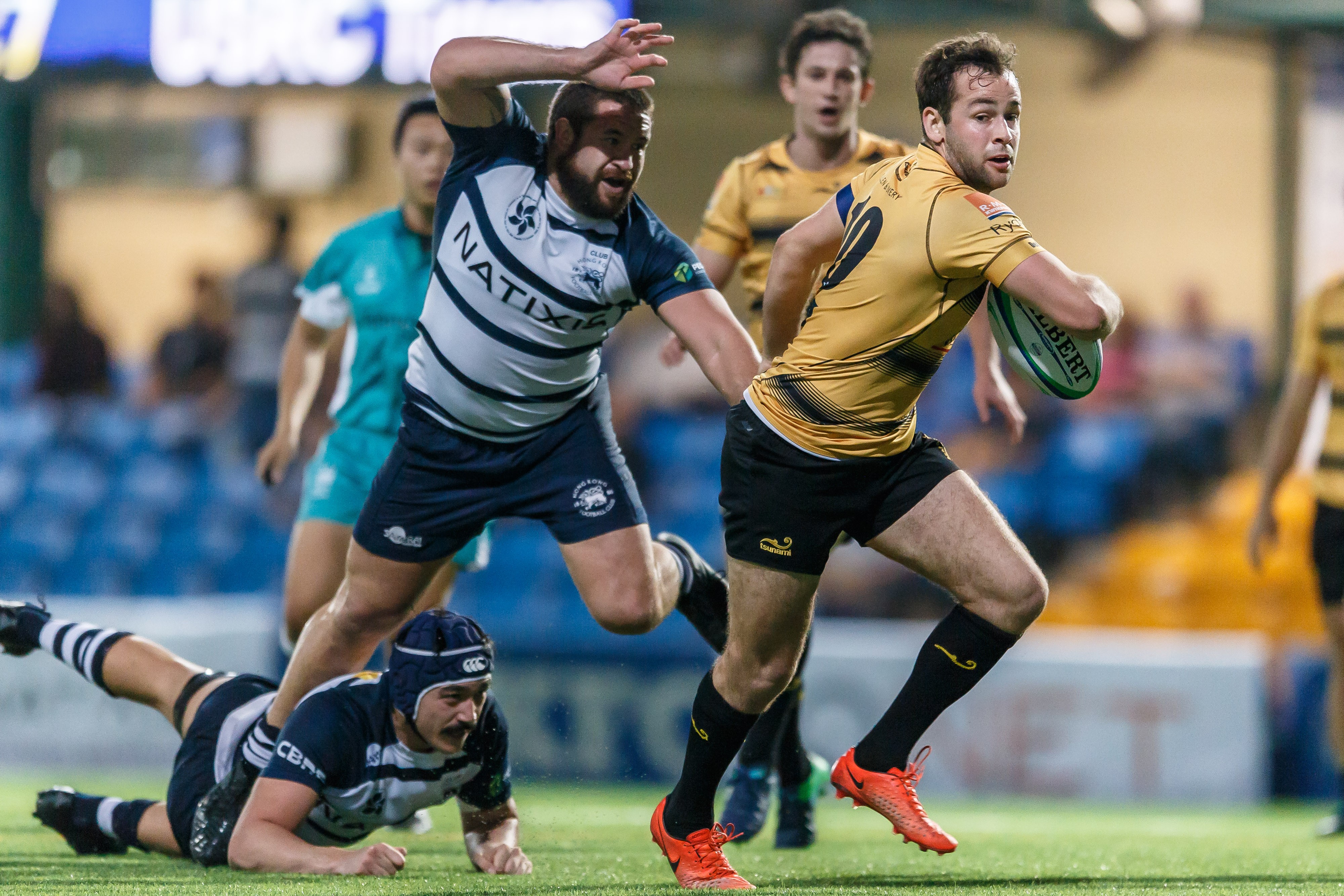 Robbie Keith makes ground for Tigers in their win over HKFC in the Hong Kong Premiership. Photo: HKRU
