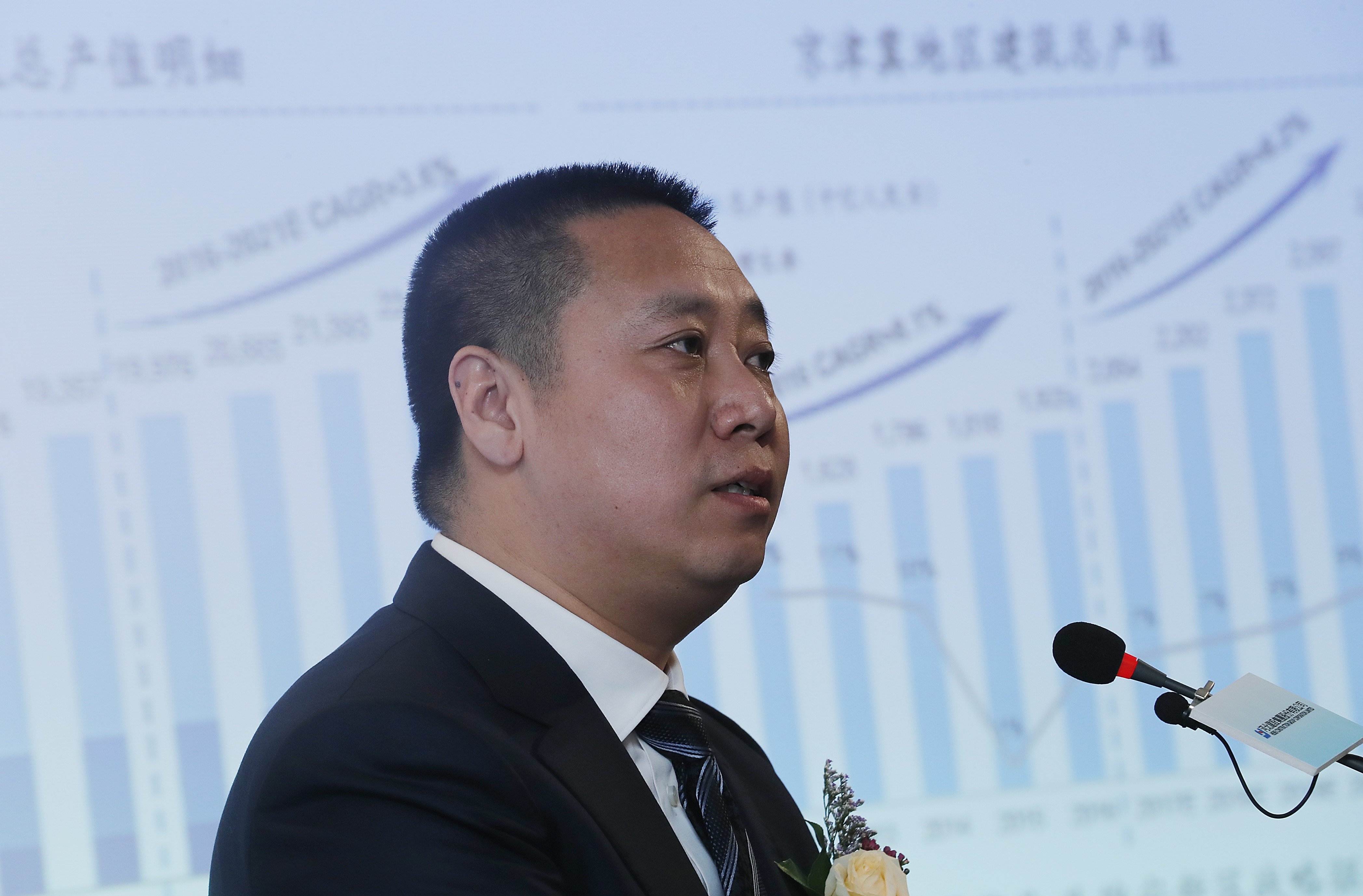 Shang Jinfeng, president and executive director of Hebei Construction, addresses a press conference on the company’s forthcoming IPO in Hong Kong. Photo: Edward Wong