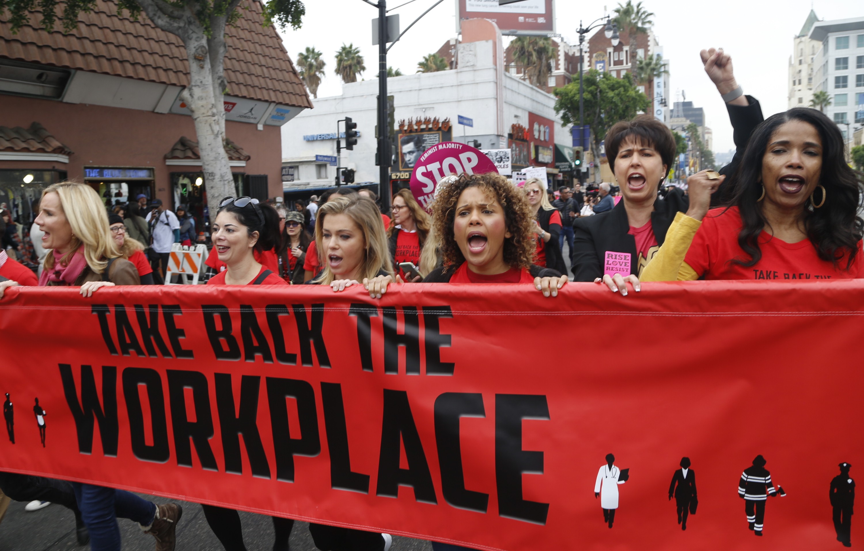 Women march against sexual assault and harassment at a #MeToo rally in Los Angeles on November 12. Photo: AP