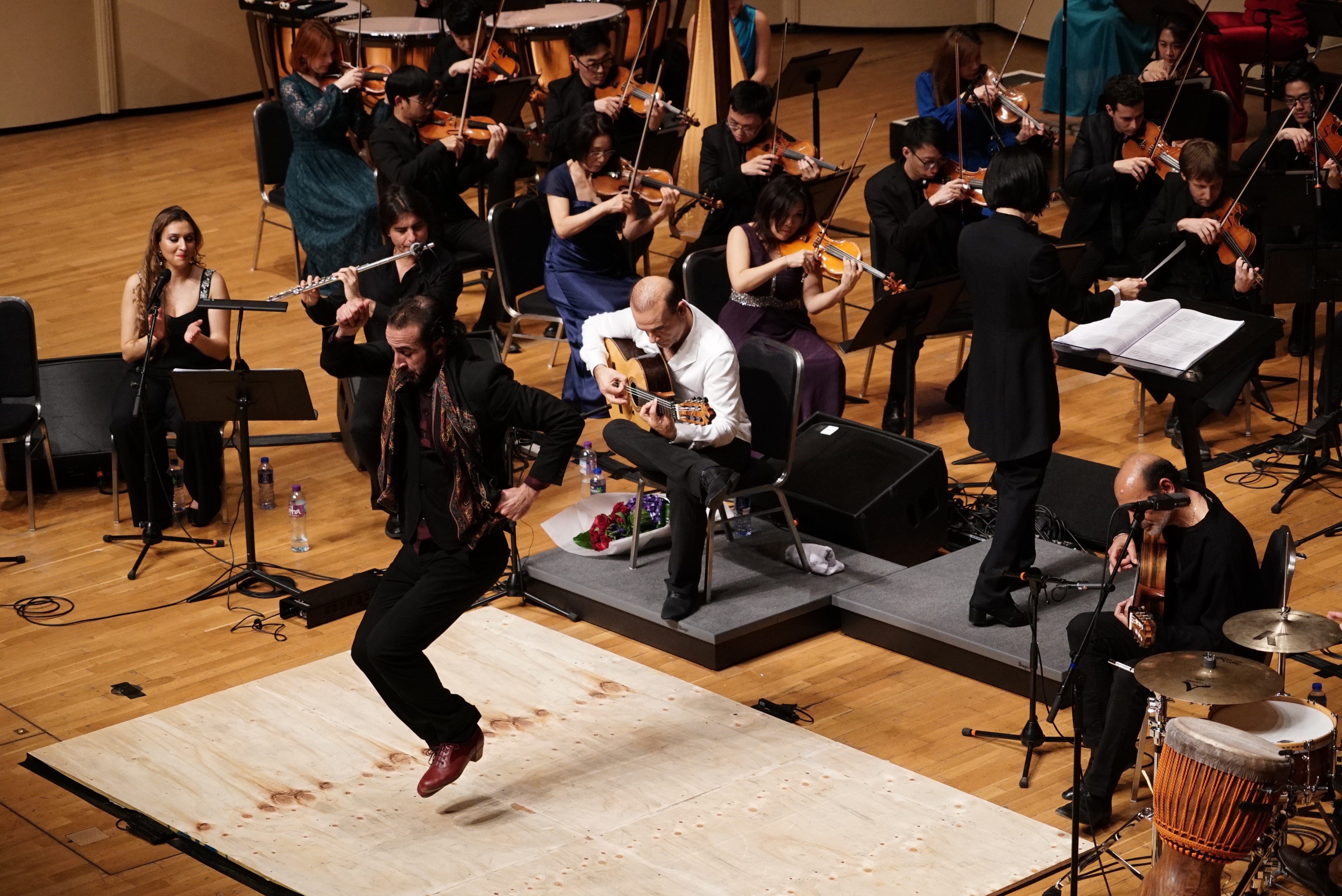 Sergio Aranda (foreground) and Juan Carmona (centre) perform Sinfonia Flamenca with the City Chamber Orchestra of Hong Kong at Sha Tin Town Hall.