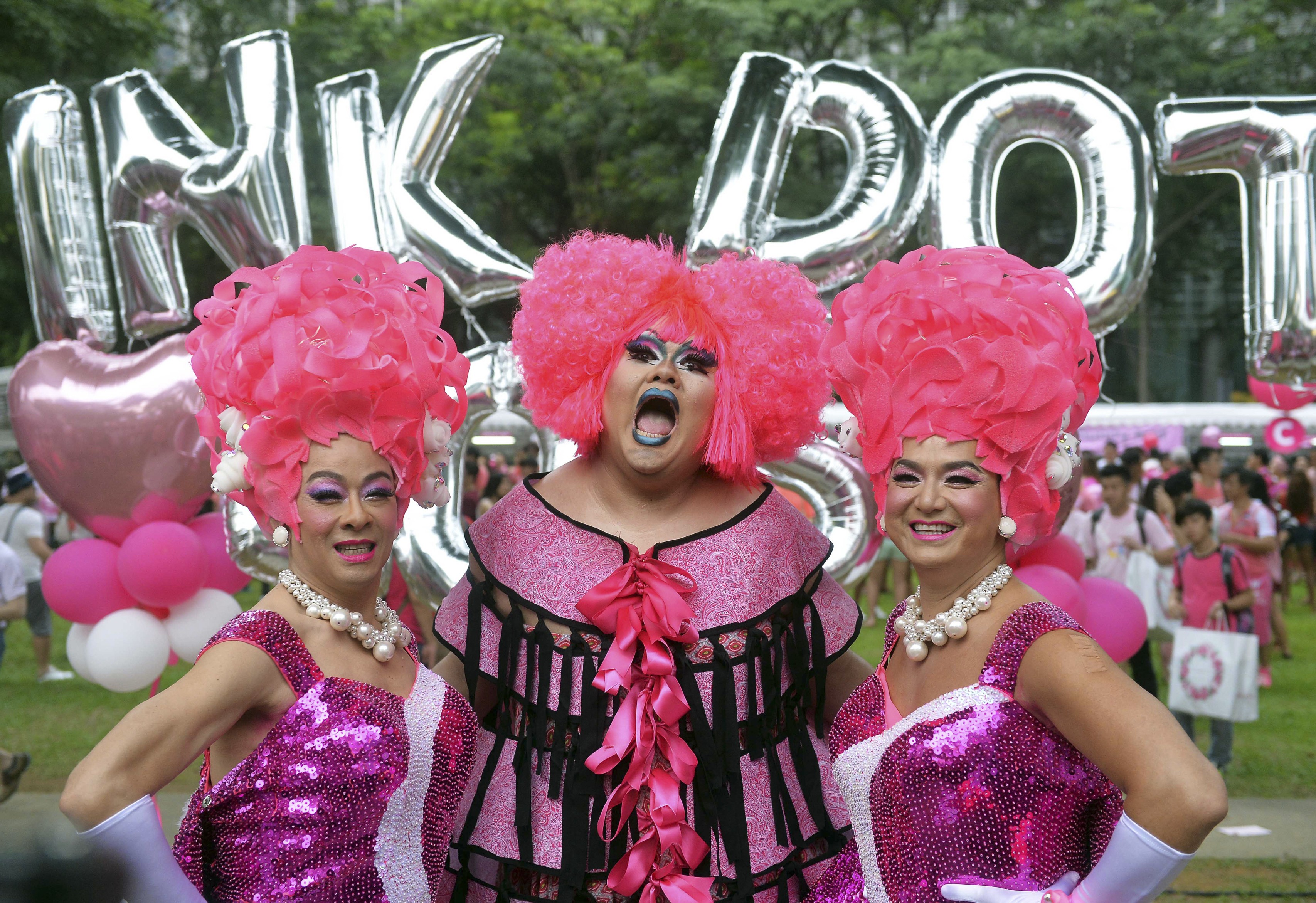 Participants dress up for the annual “Pink Dot” event in Singapore in 2015. The rally has been held every year since 2009 in support of LGBT rights. Photo: AFP