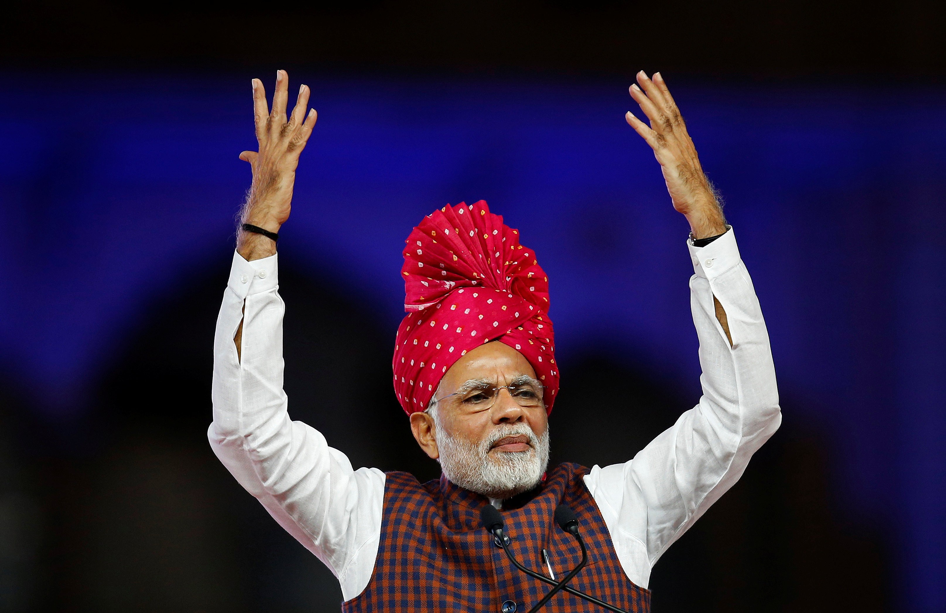 Narendra Modi addresses supporters at a campaign rally in Ahmadabad, Gujarat’s largest city. Photo: Reuters