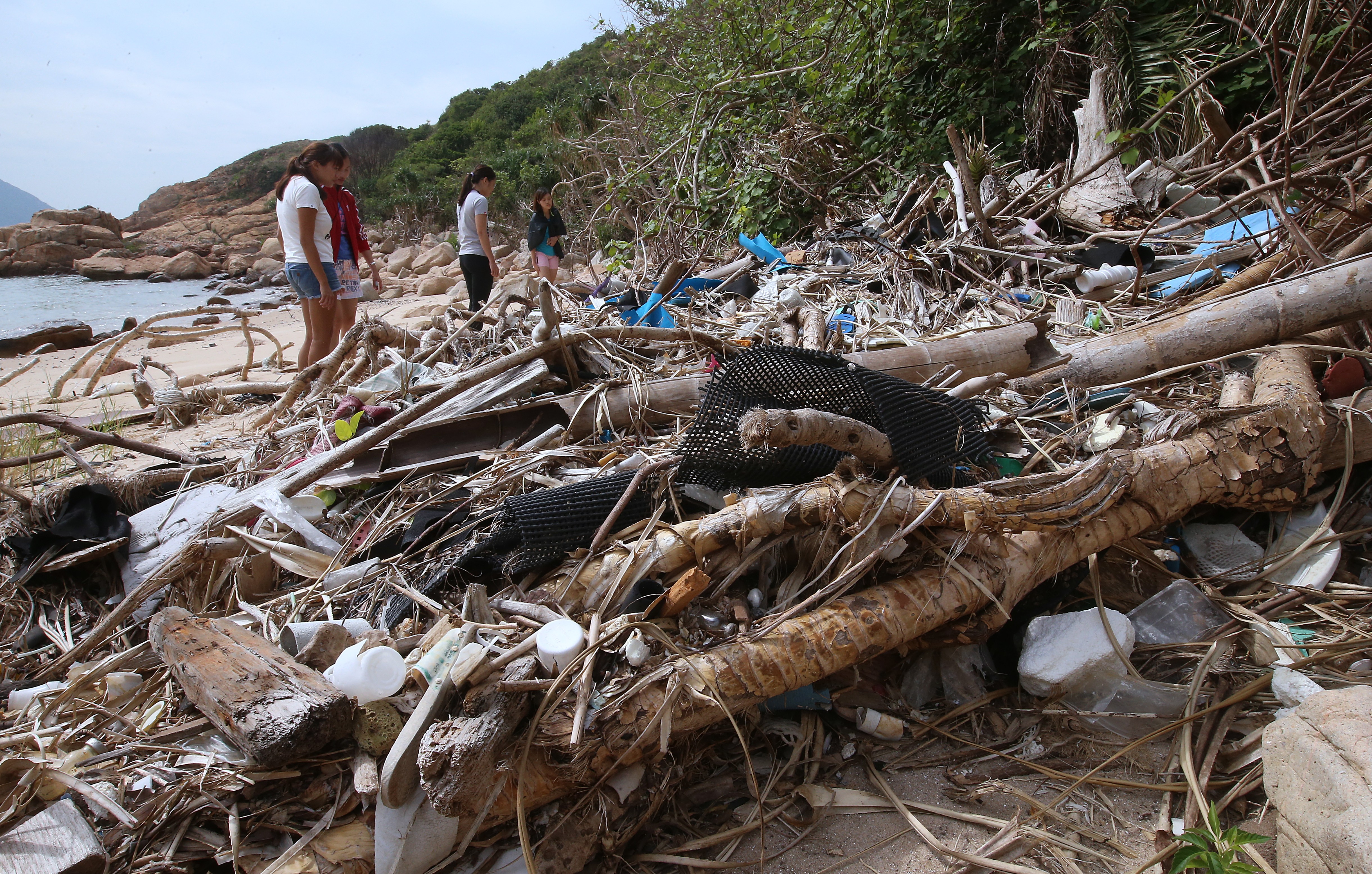 Rubbish lies strewn across a beach at Soko Island in November. Photo: K. Y. Cheng