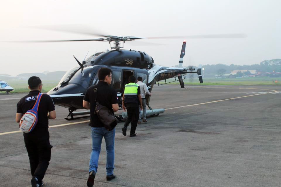 A Helicity helicopter loads passengers in Indonesia. Whitesky Aviation recently began commuter service after a year-long trial. Photo: Facebook