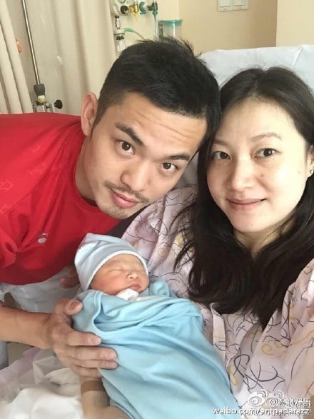 Lin Dan and wife Xie Xingfang with their child. Photo: Handout