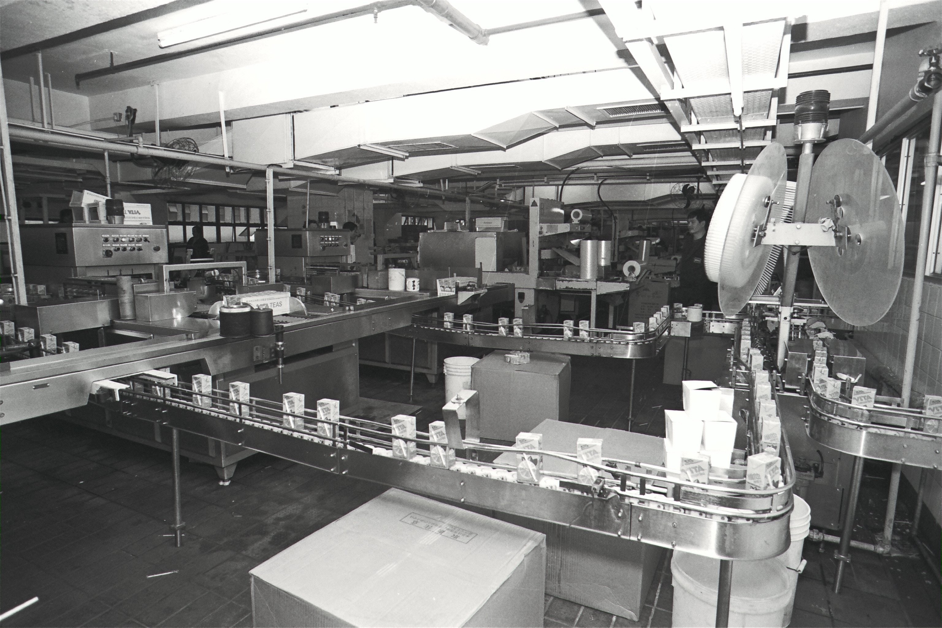 Cartons of Vitasoy drinks being manufactured in the company factory.