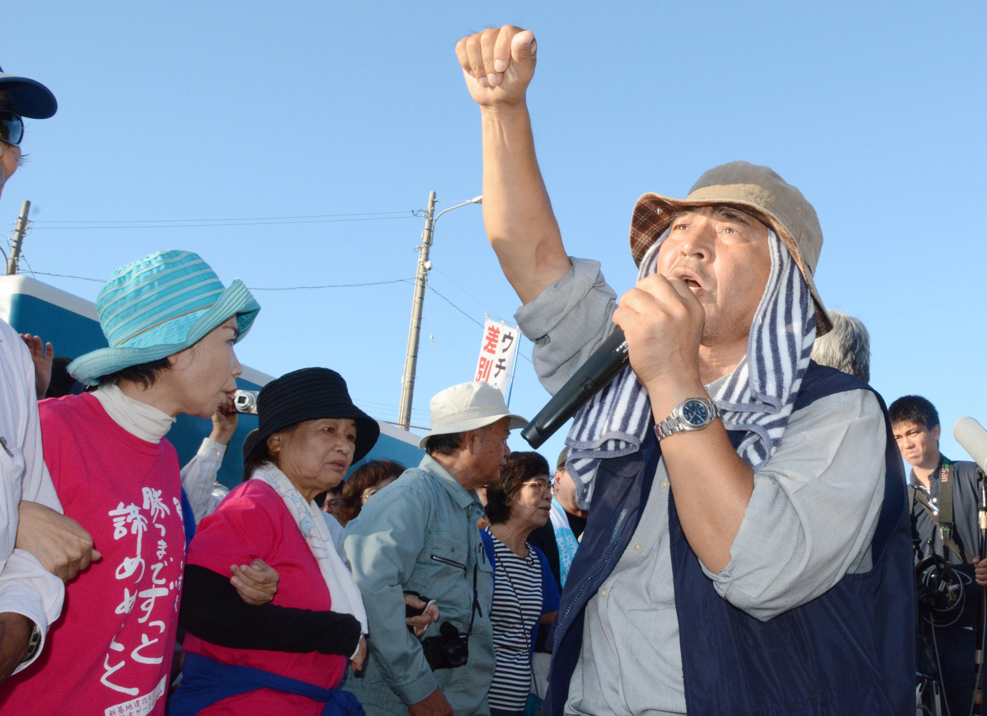 Hiroji Yamashiro rallying protesters outside the US military’s Camp Schwab in Nago, Okinawa. Photo: Kyodo