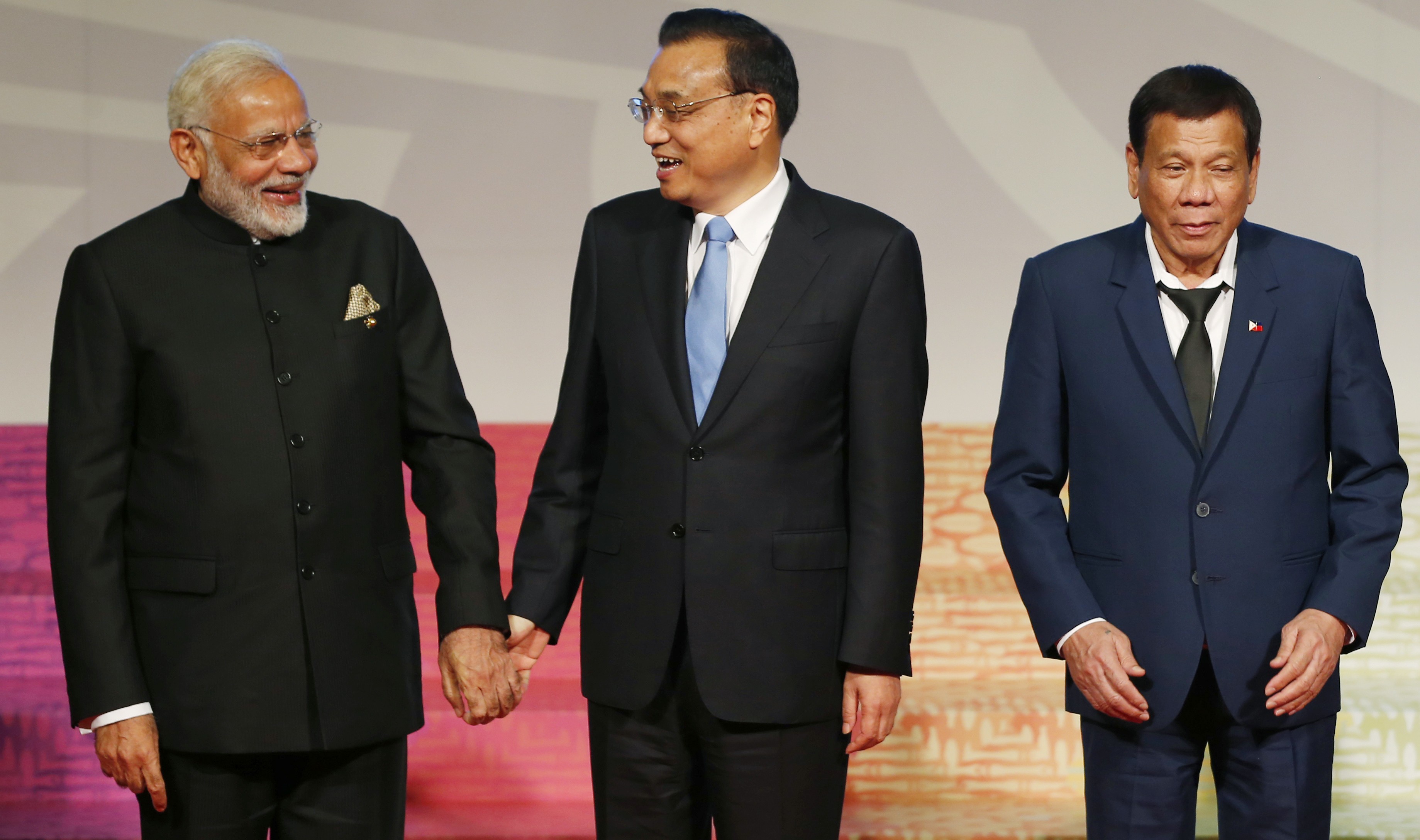Indian Prime Minister Narendra Modi, Chinese Premier Li Keqiang and Philippine President Rodrigo Duterte take part in the East Asia Summit at the 31st Asean Summit in November in Manila. China’s rapid growth has brought opportunities for other Asian countries, India and Asean nations included, but also given neighbours concerns about its outsized influence. Photo: AP