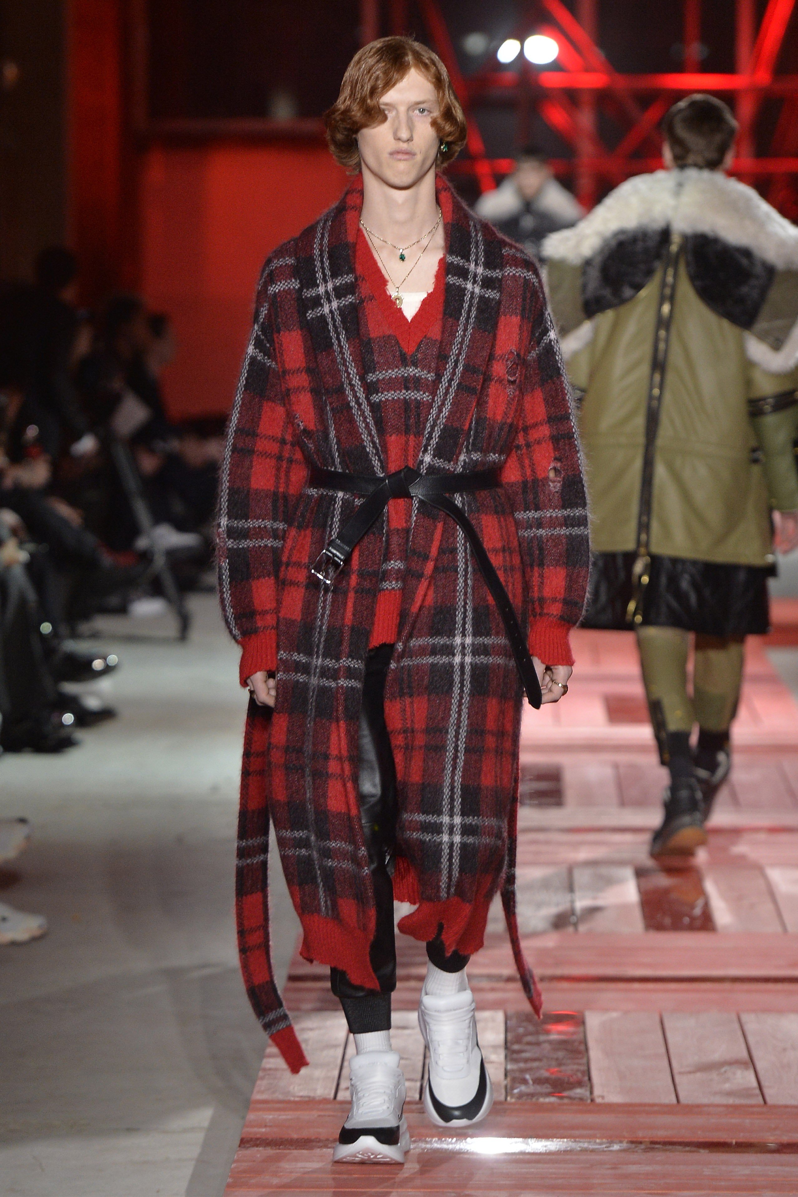 A check pattern trench coat in Alexander McQueen’s autumn/winter 2018 show.
